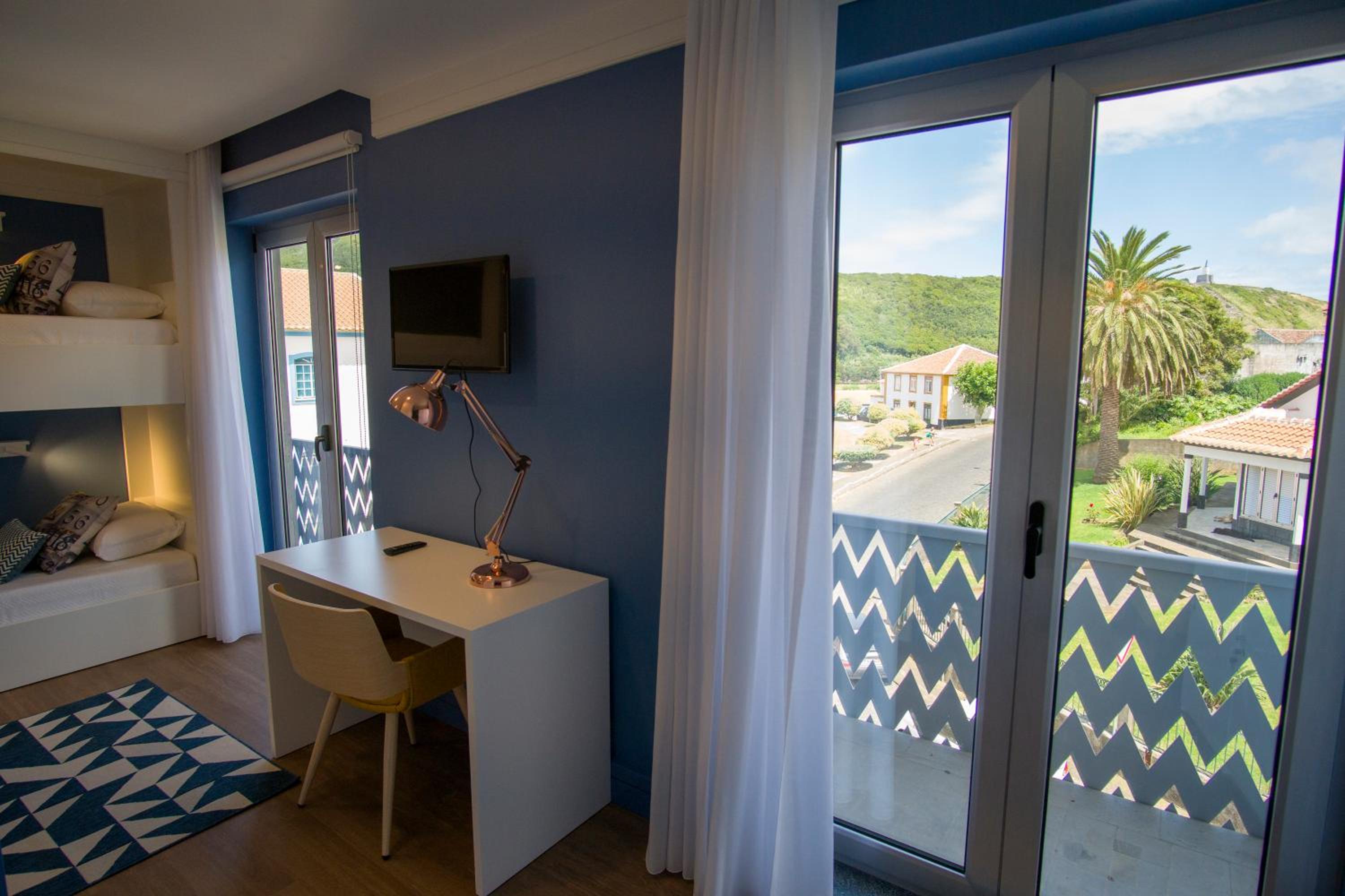 Family Room with Balcony - Photo 17