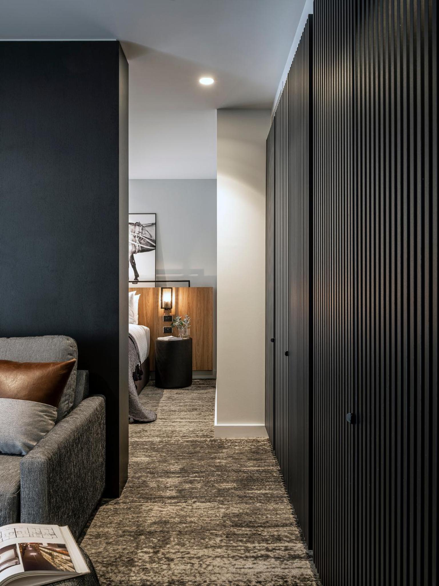 Deluxe King Suite with Sofa Bed - Photo 1