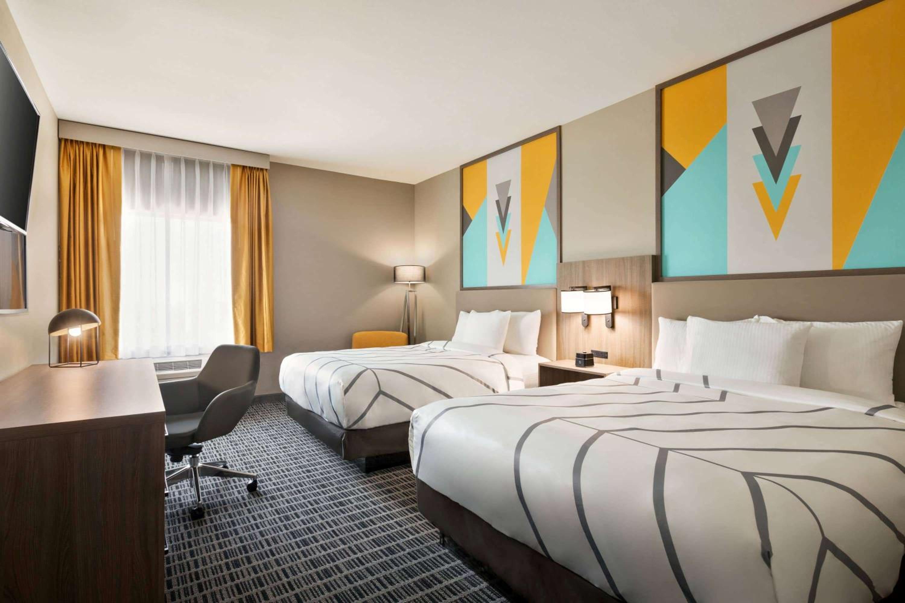 Queen Room with Two Queen Beds - Photo 1