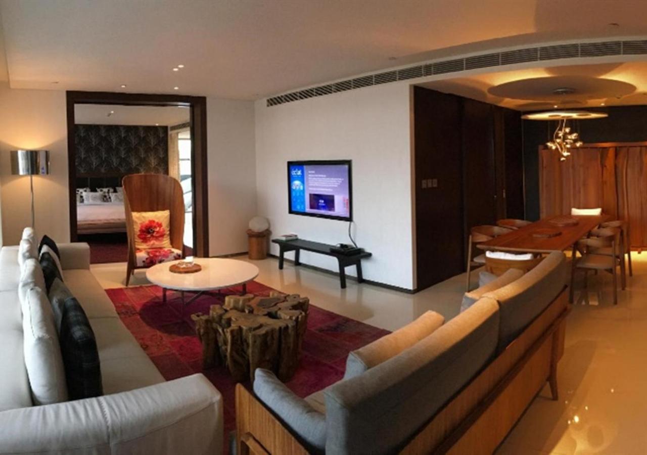 living room with couches and a flat screen tv