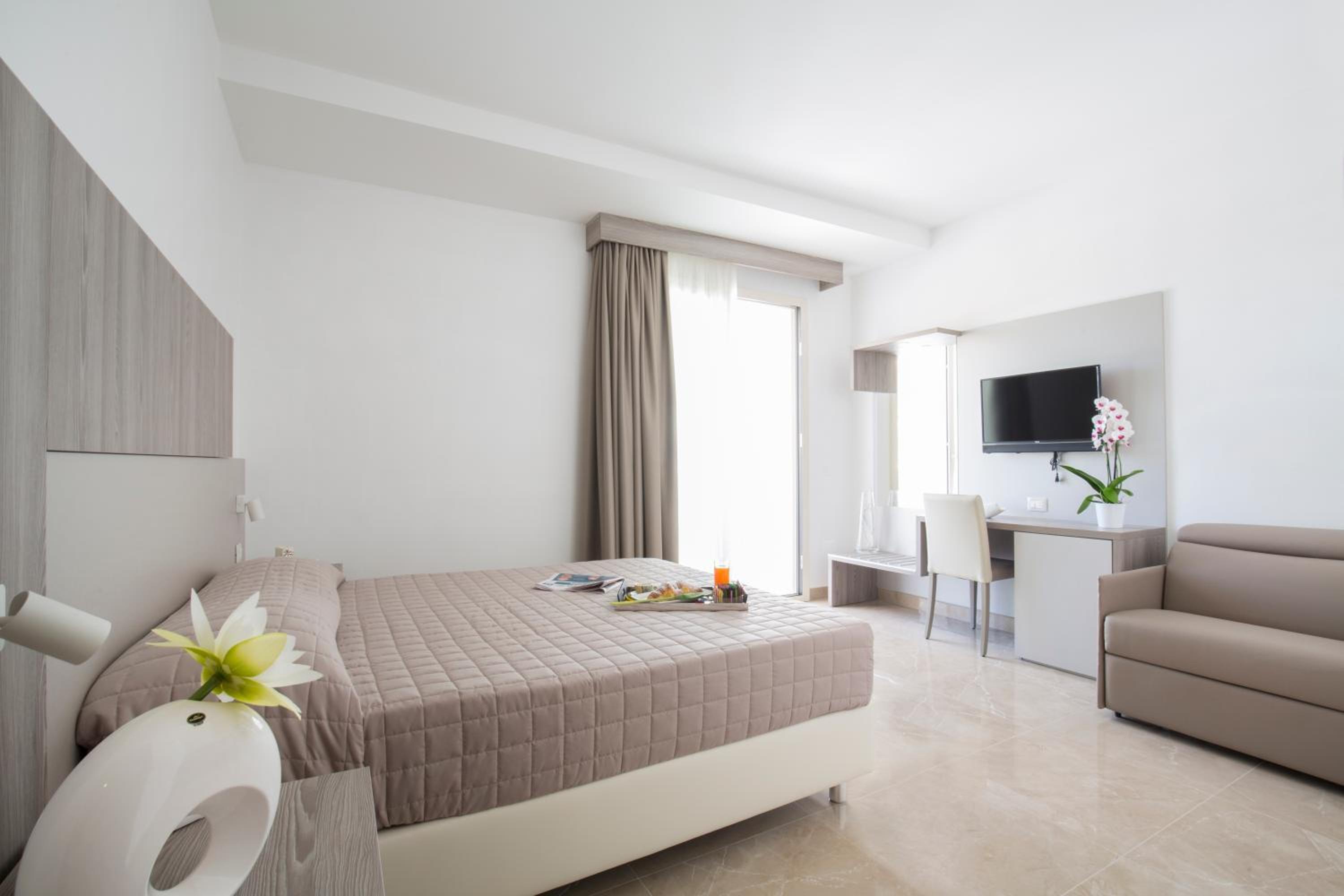 Comfort Triple Room (2 Adults + 2 Children)