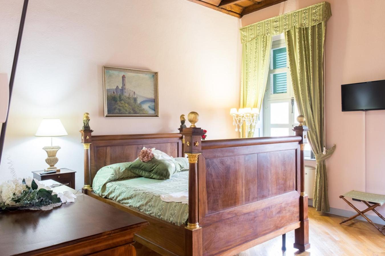 Deluxe Quadruple Room - Photo 1