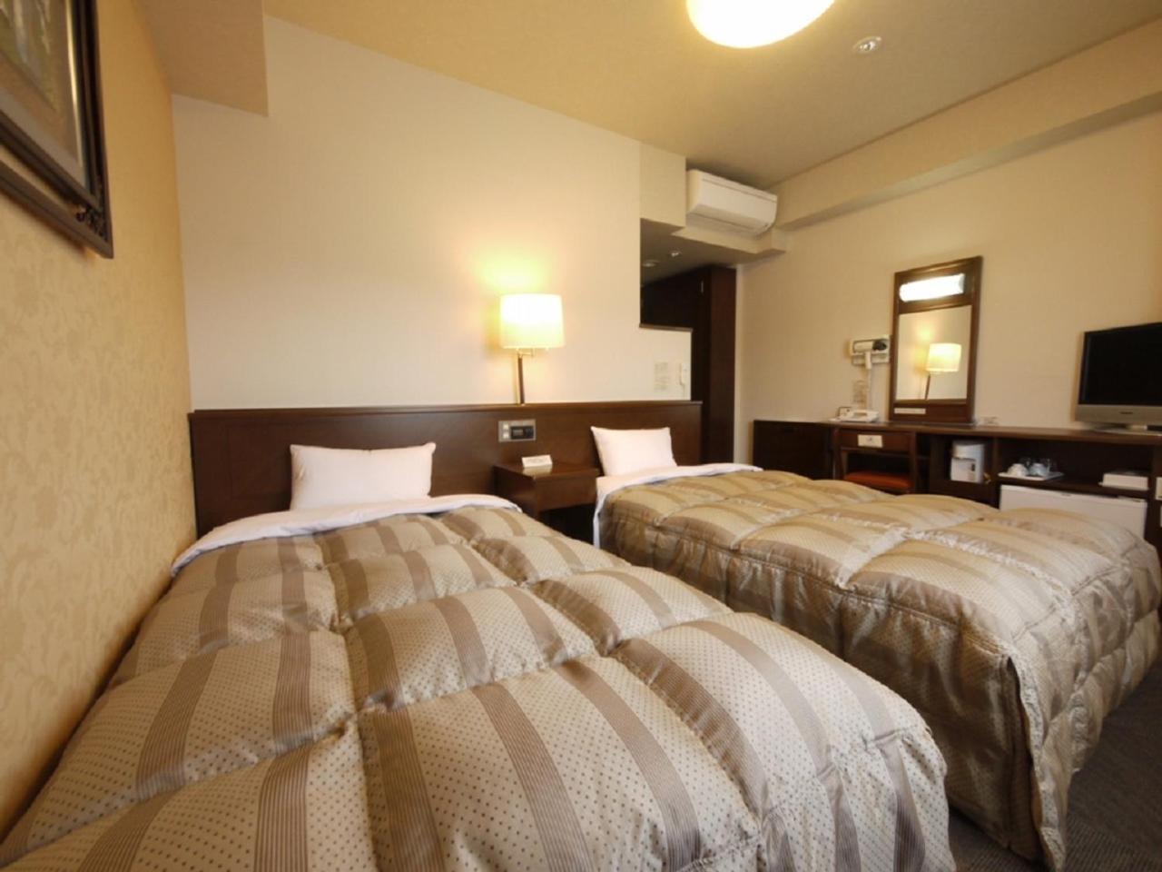 Twin Room - Non-Smoking - Photo 1