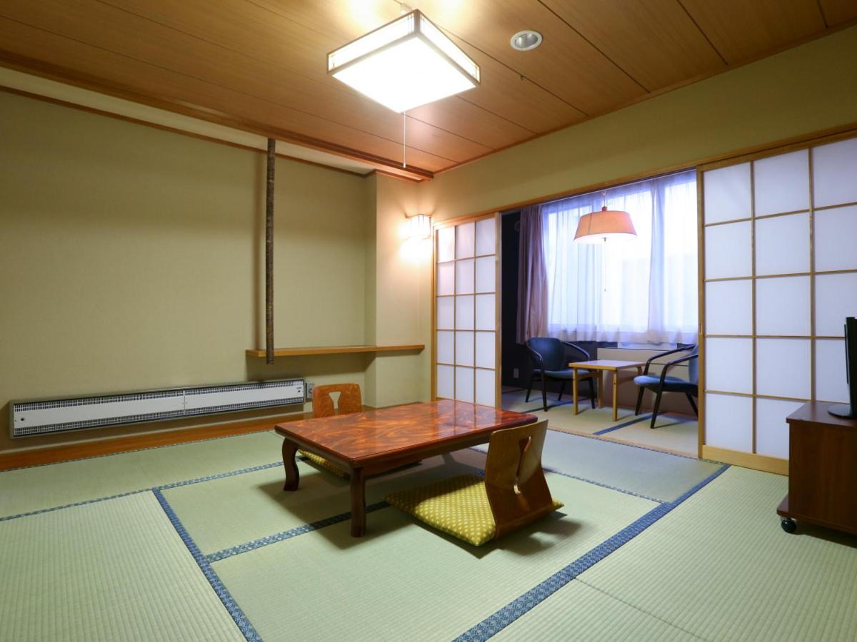 Quadruple Room with Private Bathroom - Non-Smoking photo 2