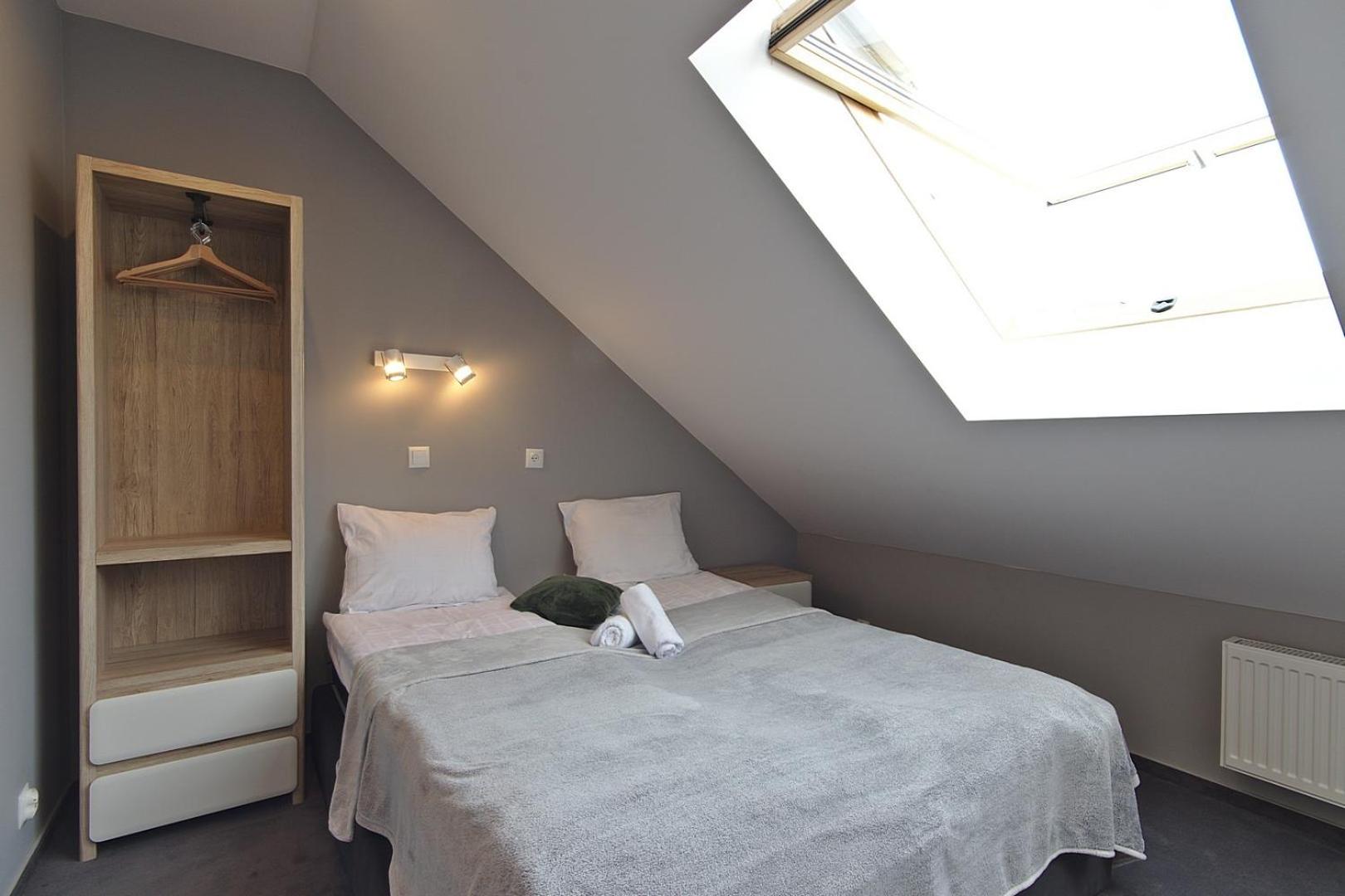 Deluxe Two-Bedroom Apartment with Balcony and air conditioning in the Attic - Photo 3