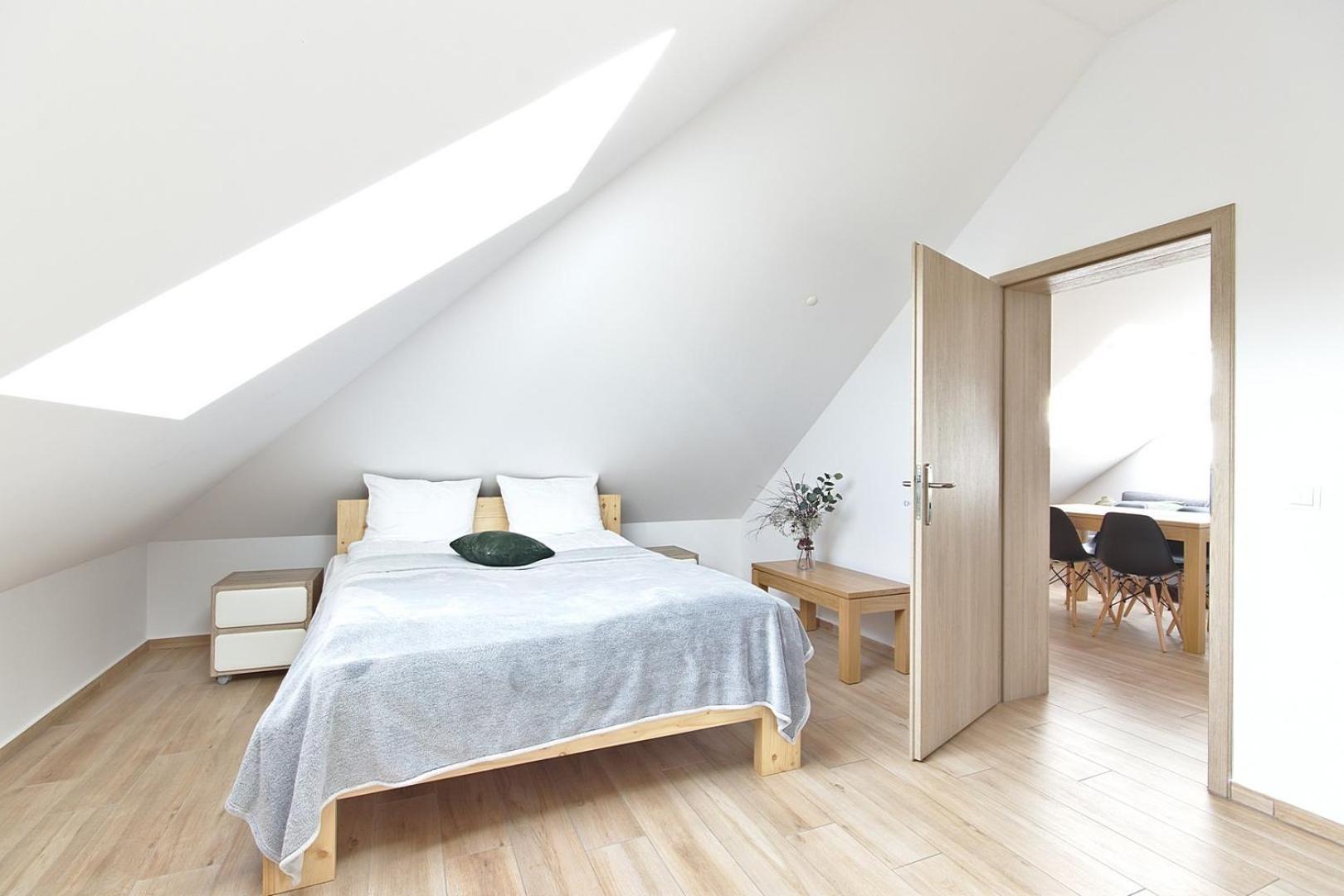 Deluxe Two-Bedroom Apartment with Balcony and air conditioning in the Attic - Photo 2