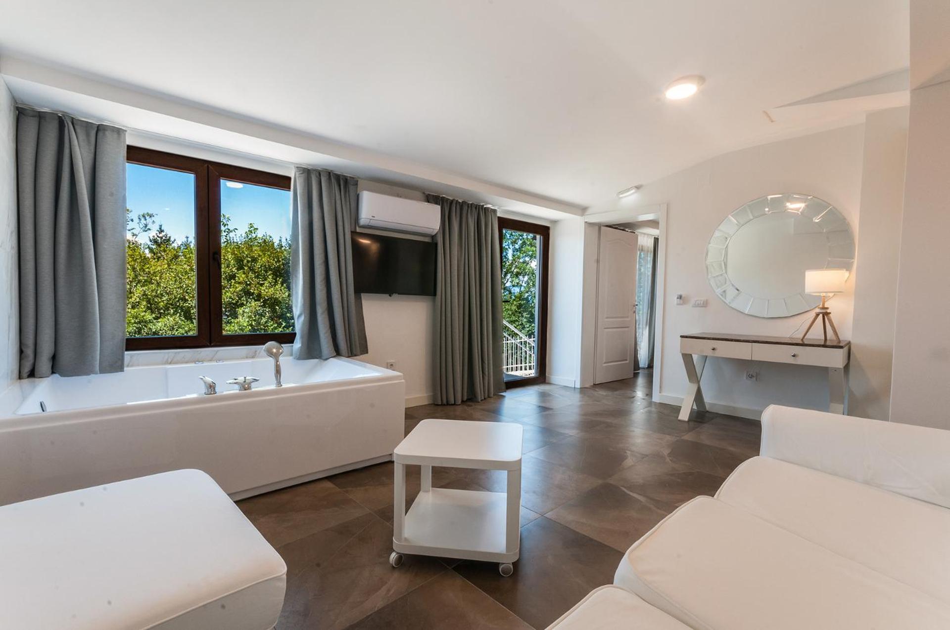 Intimate Junior Suite with Hot Tub - Photo 1