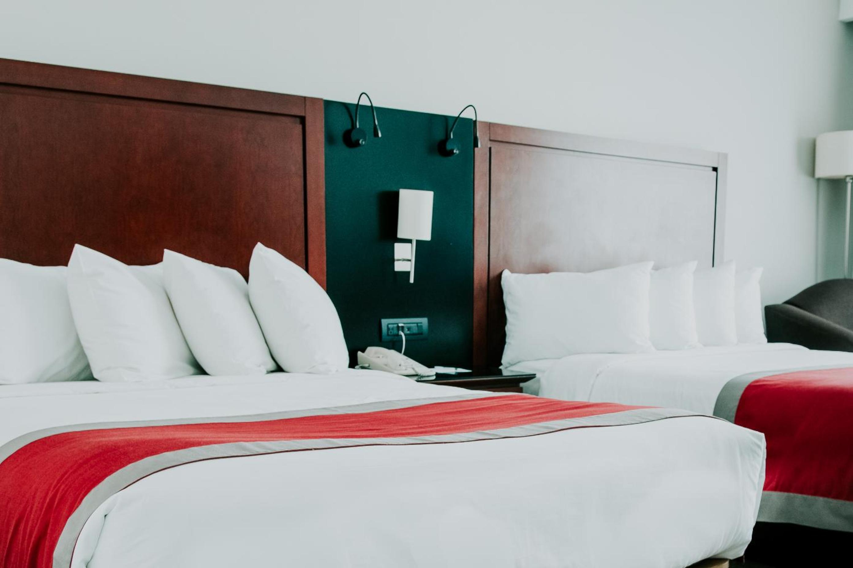 Quarto Duplo Premium com Duas Camas de Casal