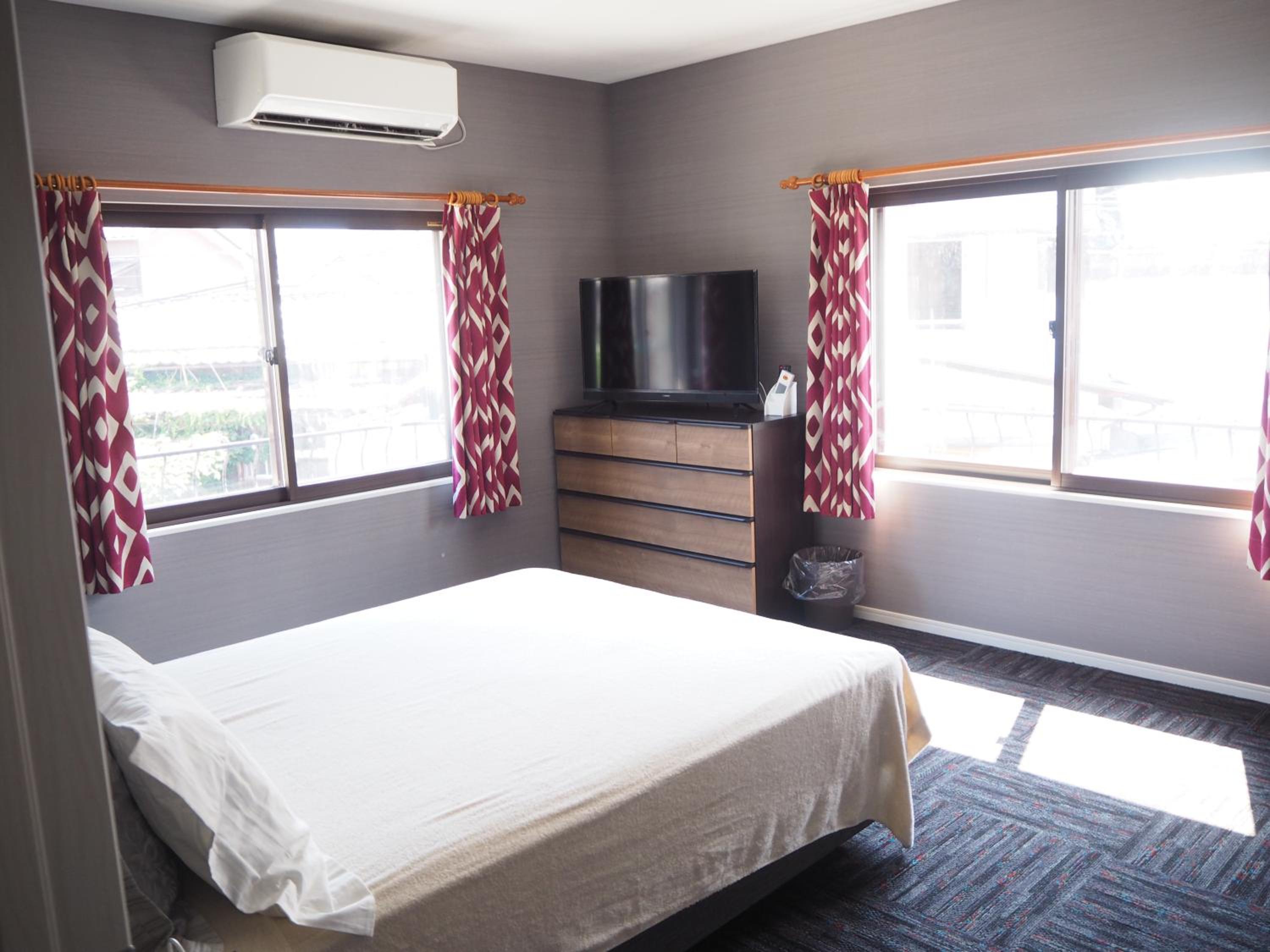 Three-Bedroom House - Photo 11