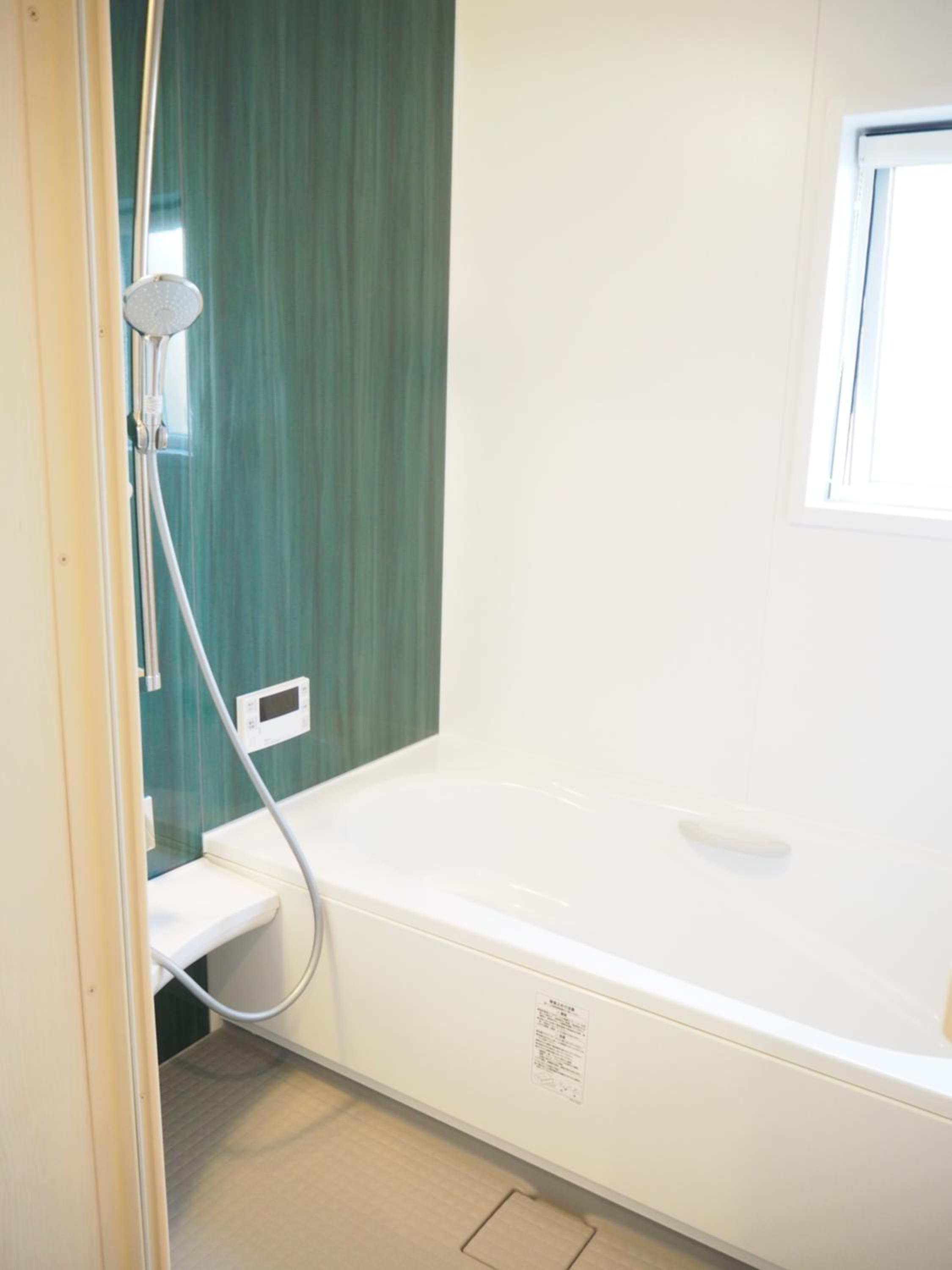 Three-Bedroom House - Photo 27