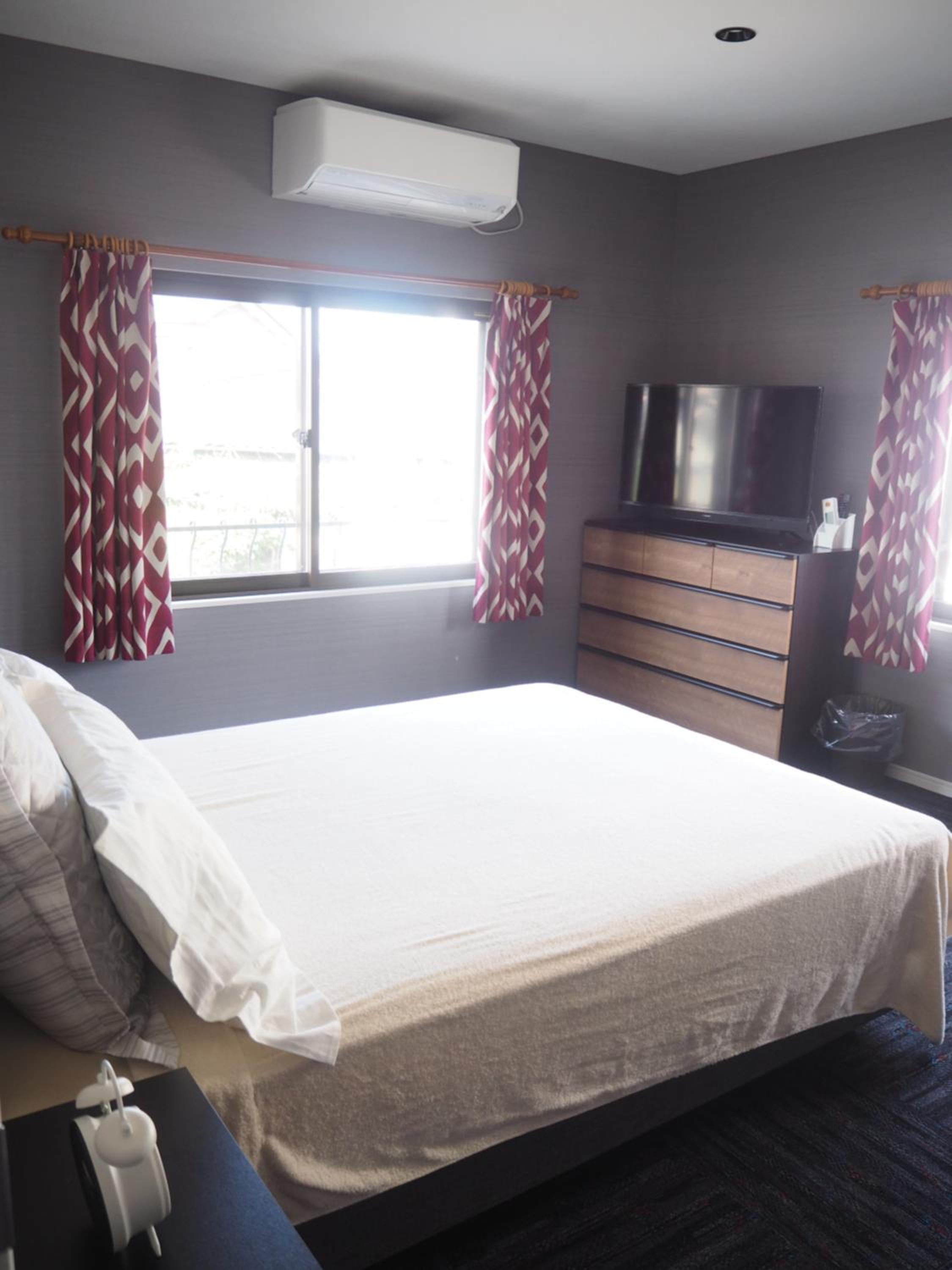 Three-Bedroom House - Photo 31