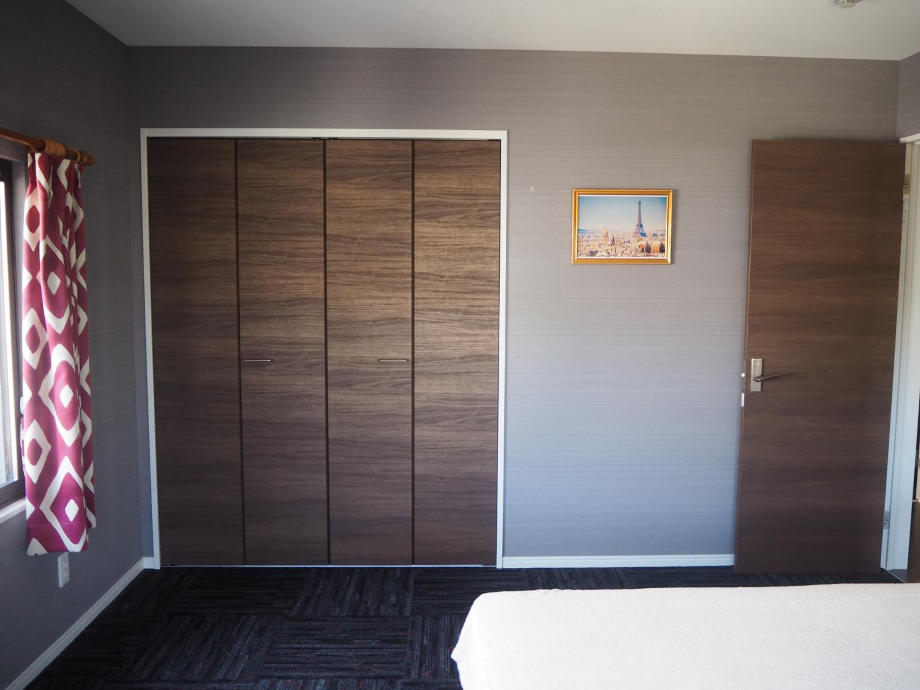Three-Bedroom House - Photo 34