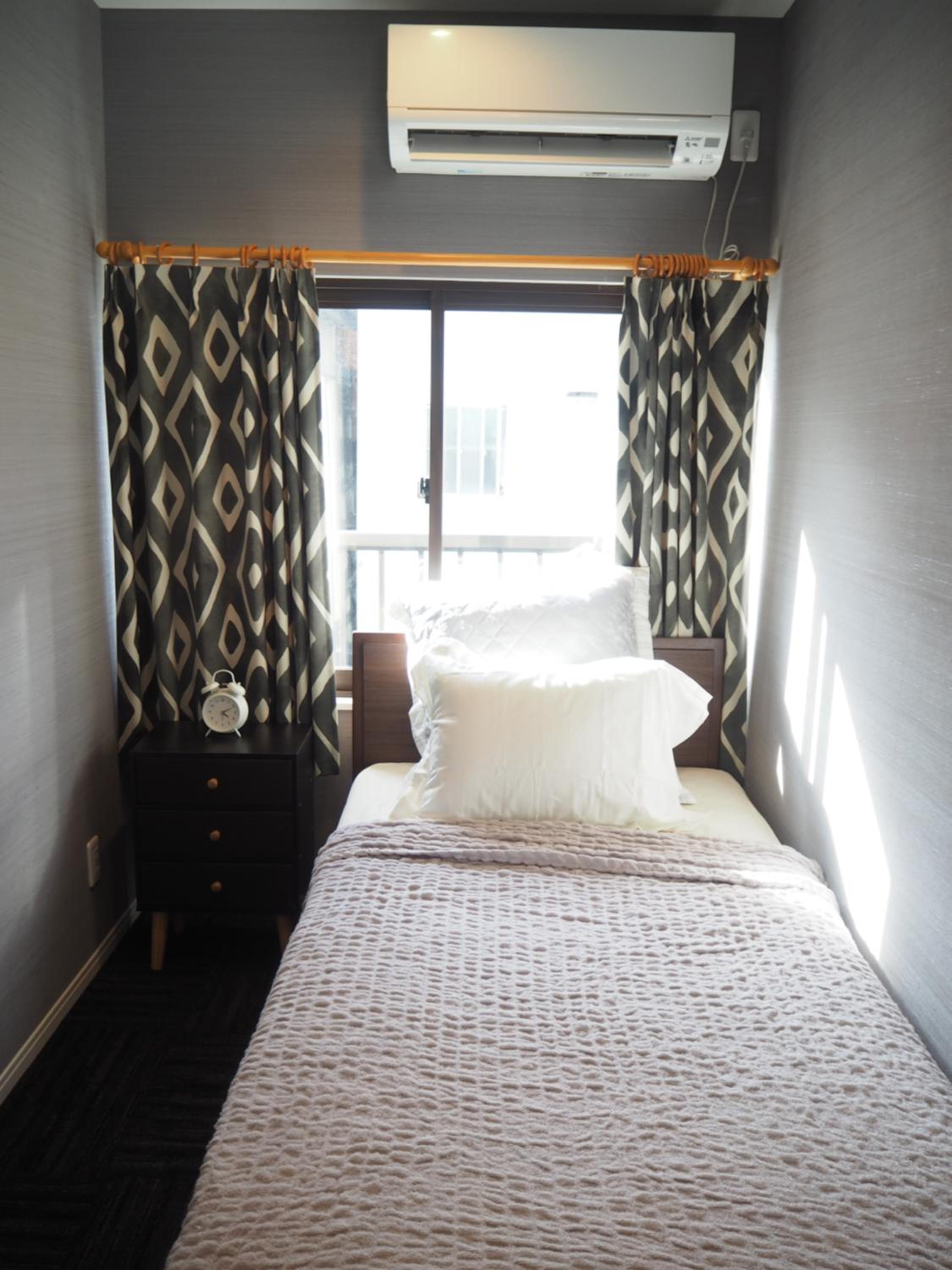 Three-Bedroom House - Photo 40