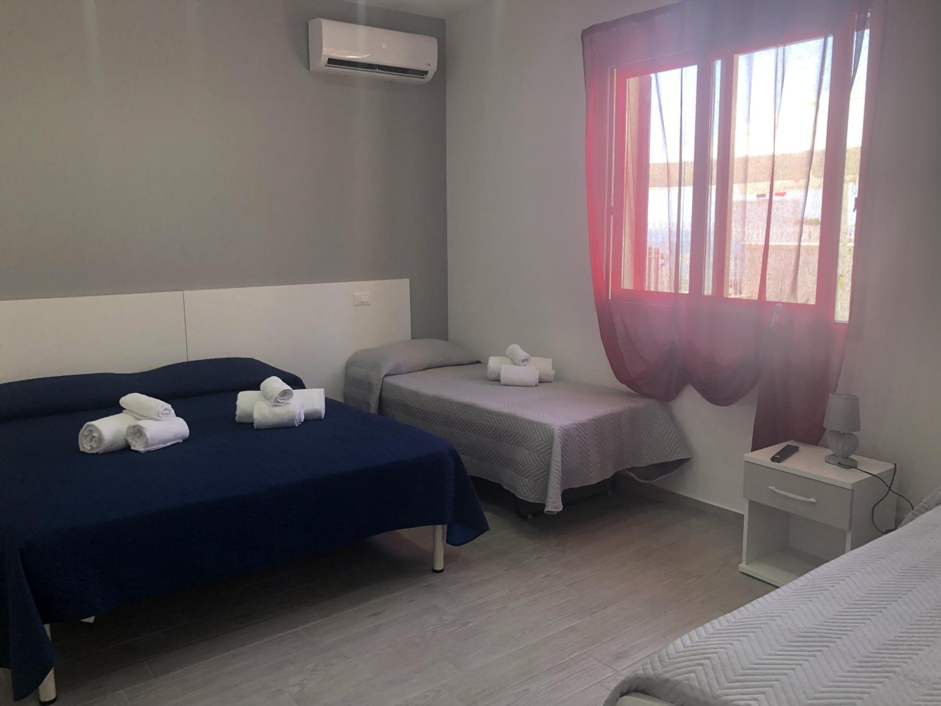 Deluxe Quadruple Room - Photo 1
