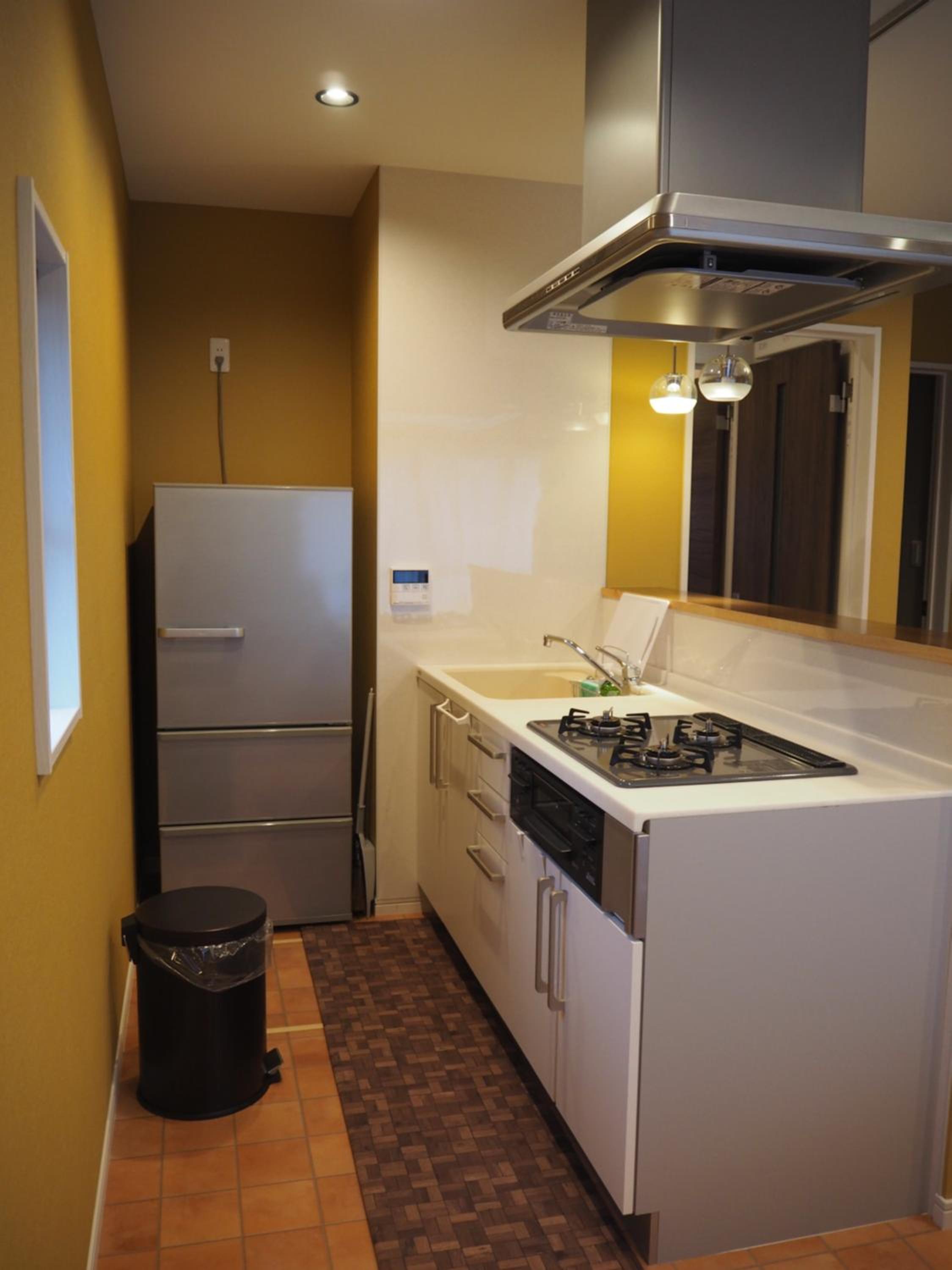 Three-Bedroom House - Photo 48