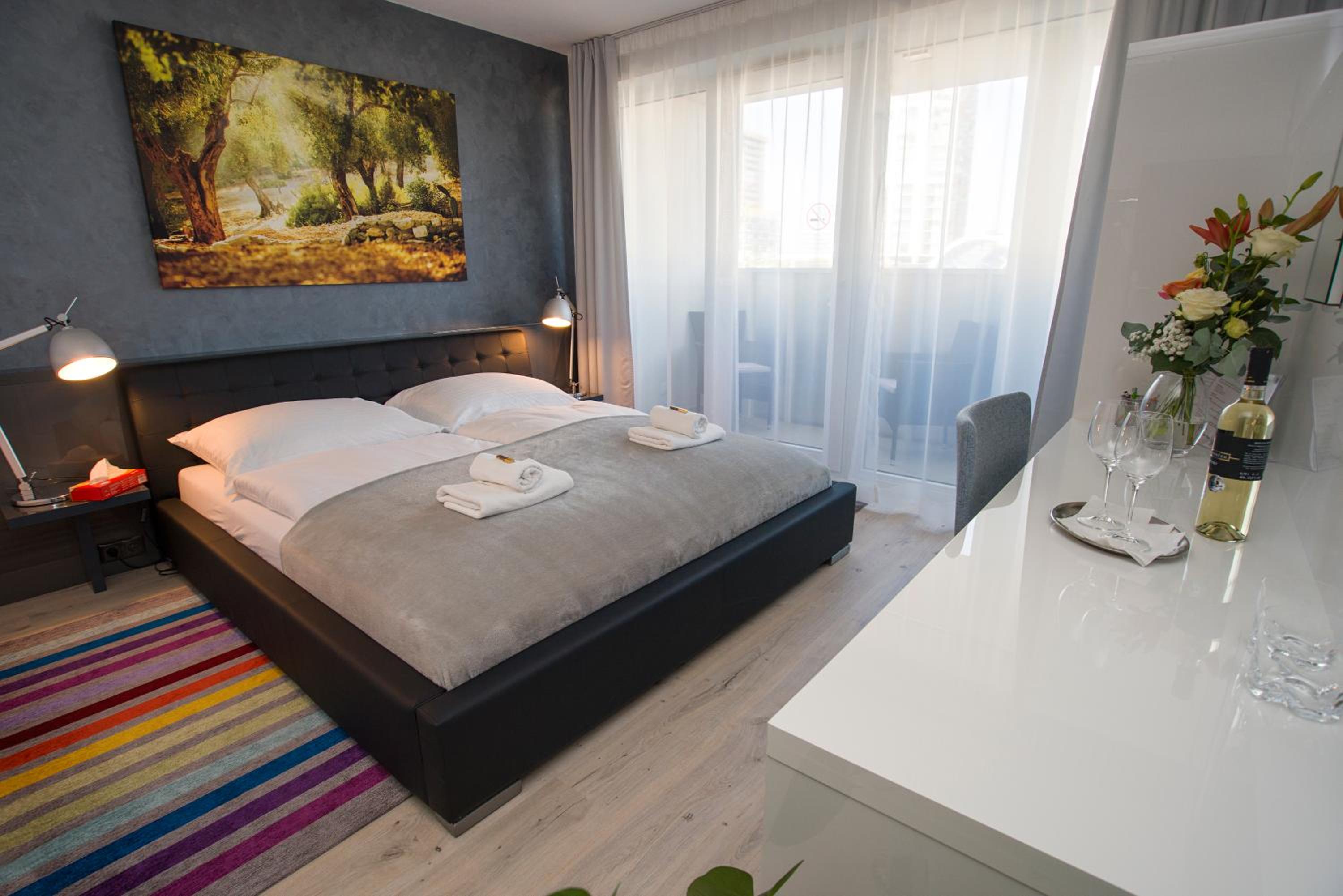Deluxe Double Room with Balcony - Photo 1