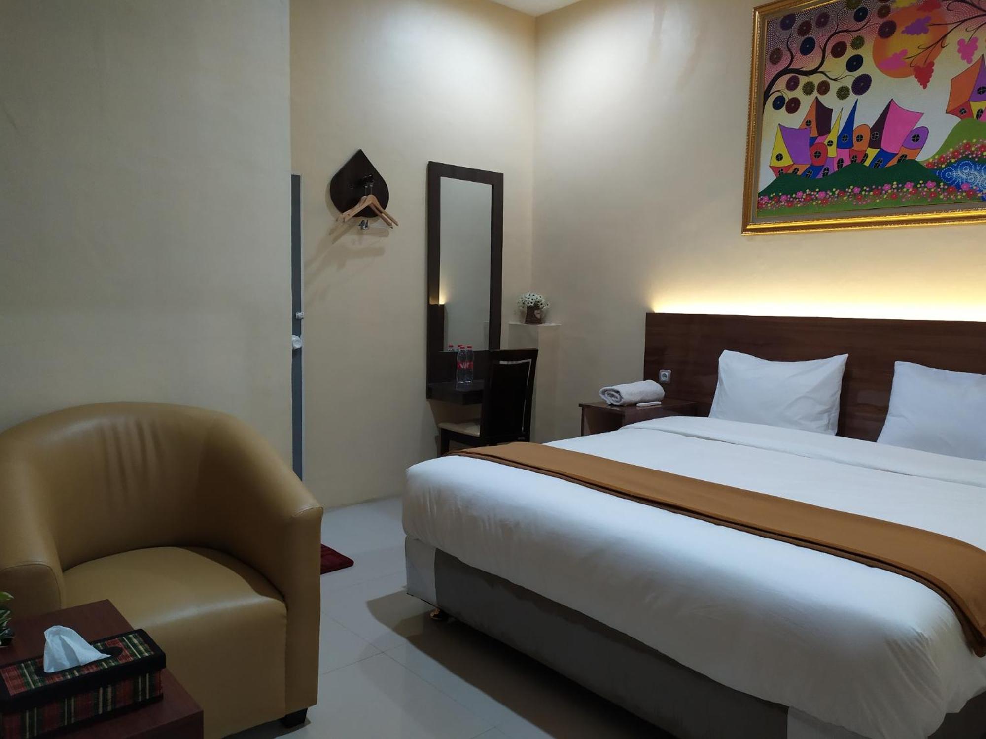Deluxe Room - Photo 1