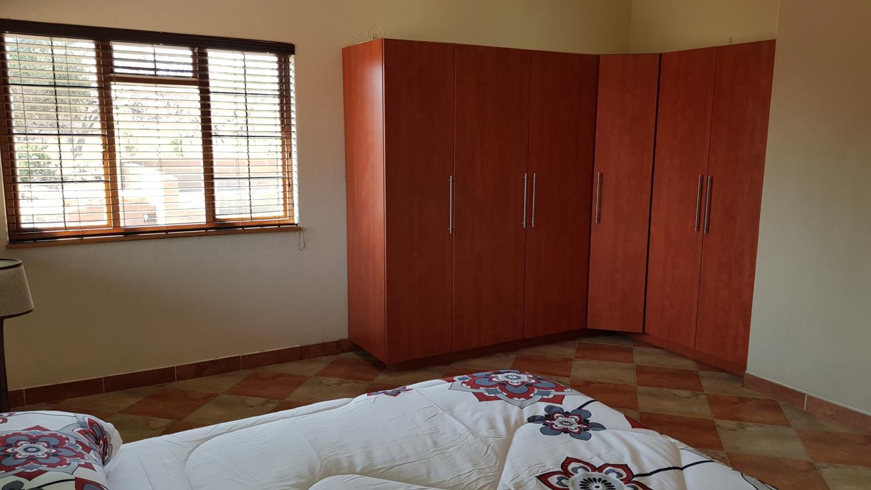Three-Bedroom Apartment - Photo 19