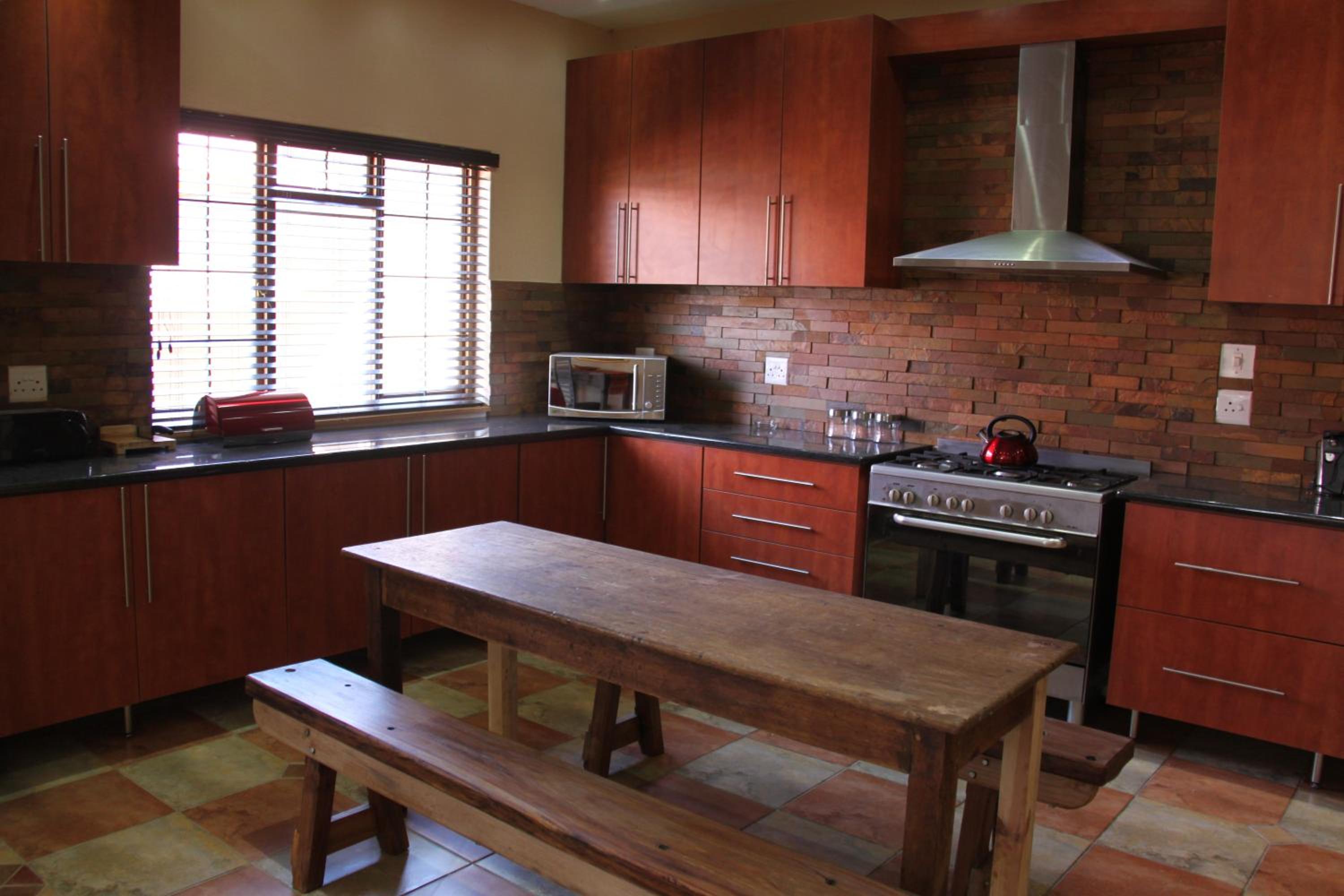 Three-Bedroom Apartment - Photo 40