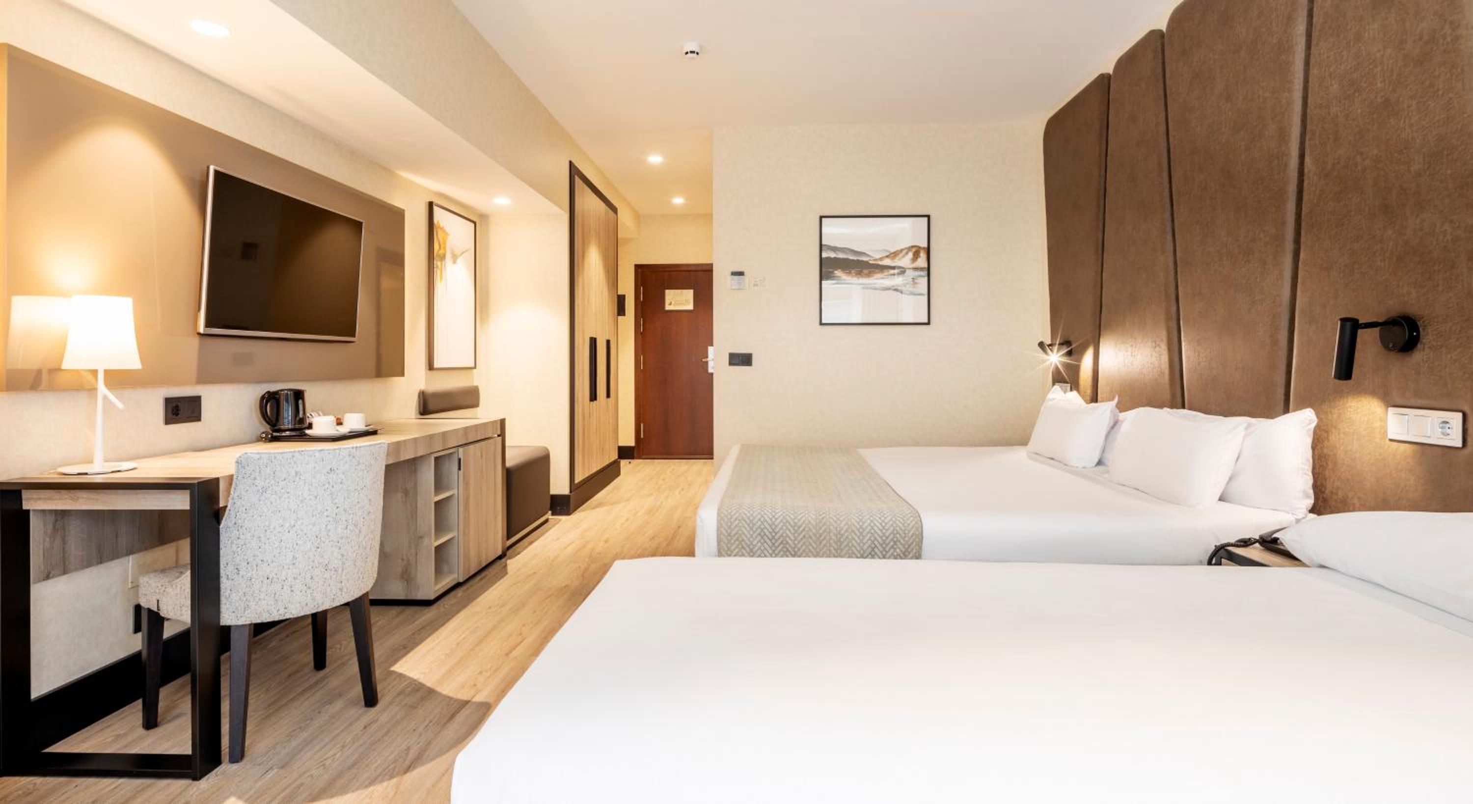 Double Room with Extra Bed (2 Adults + 1 Child)