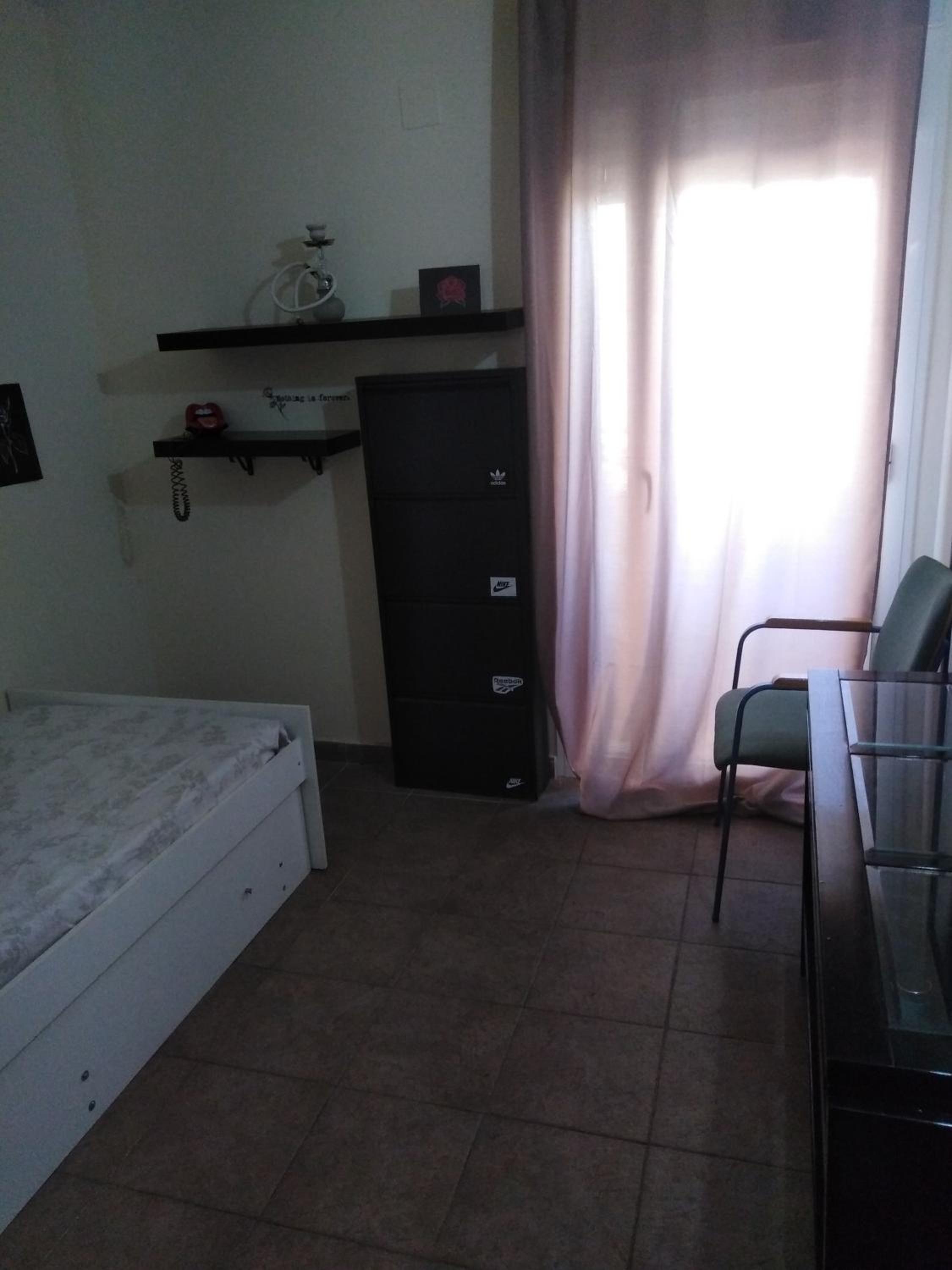 Habitación Individual Estándar con Baño Compartido
