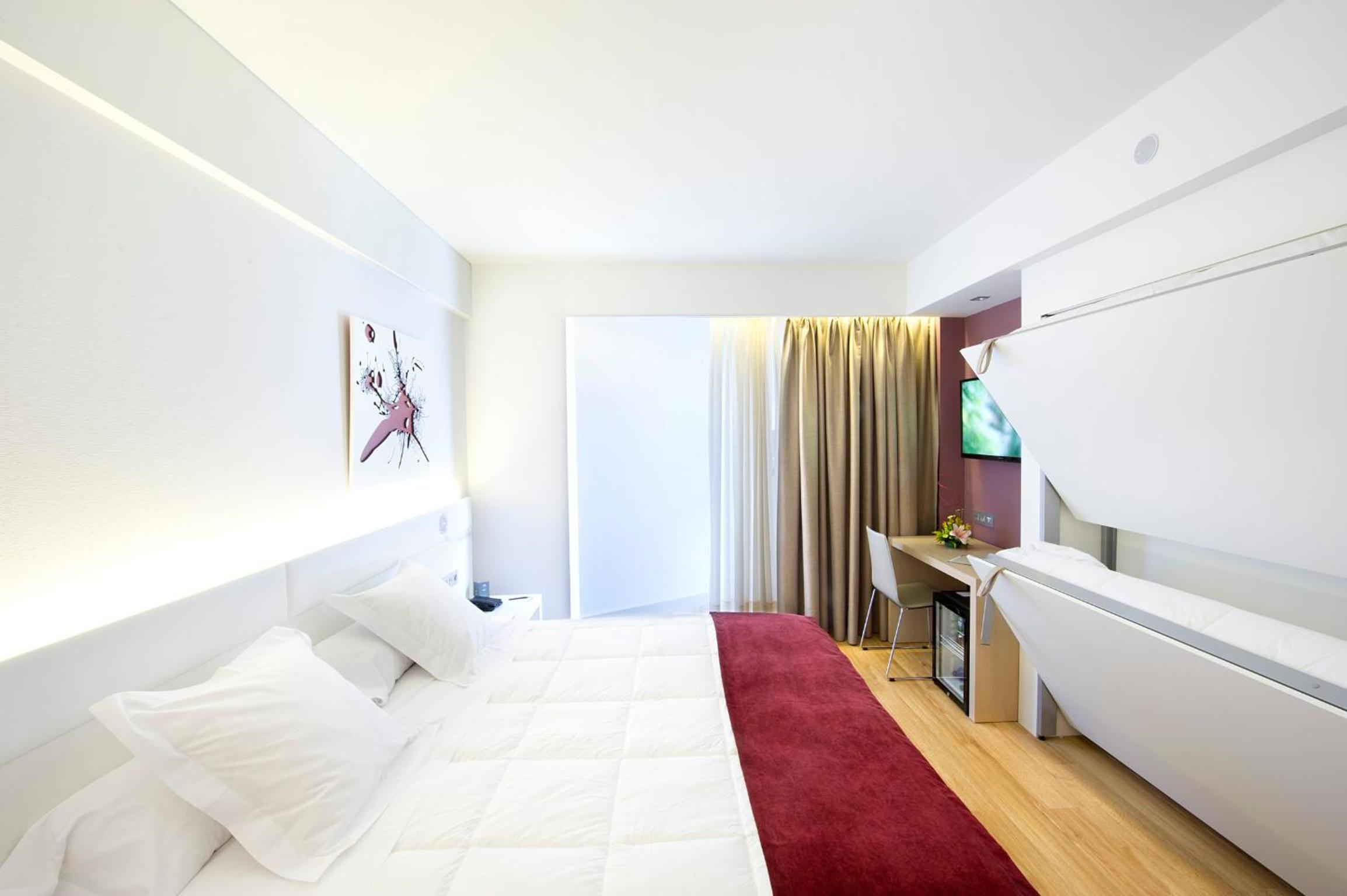 Habitación Cuádruple (2 Adultos + 2 Niños)