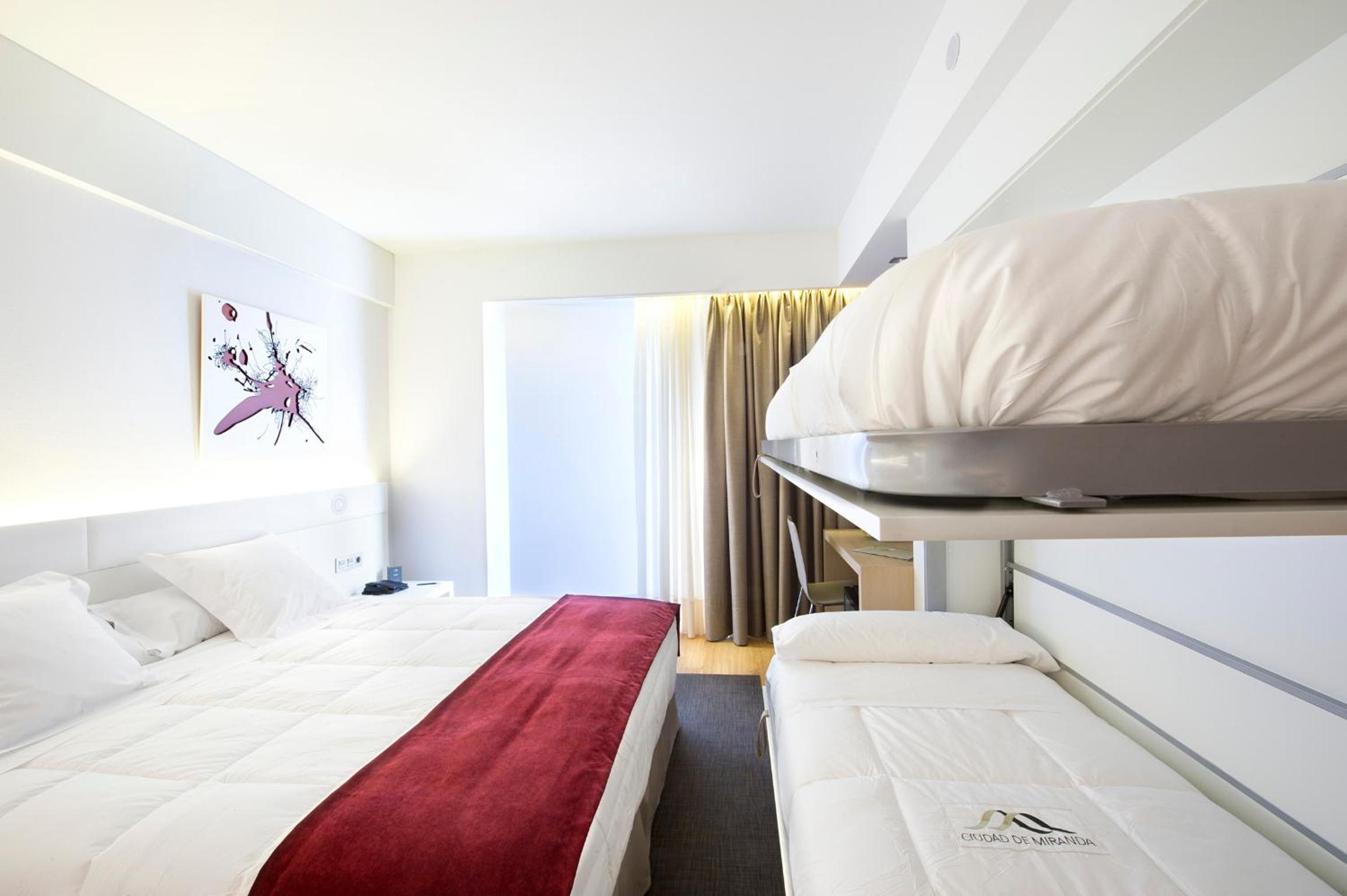 Quadruple Room (2 Adults + 2 Children) photo 3