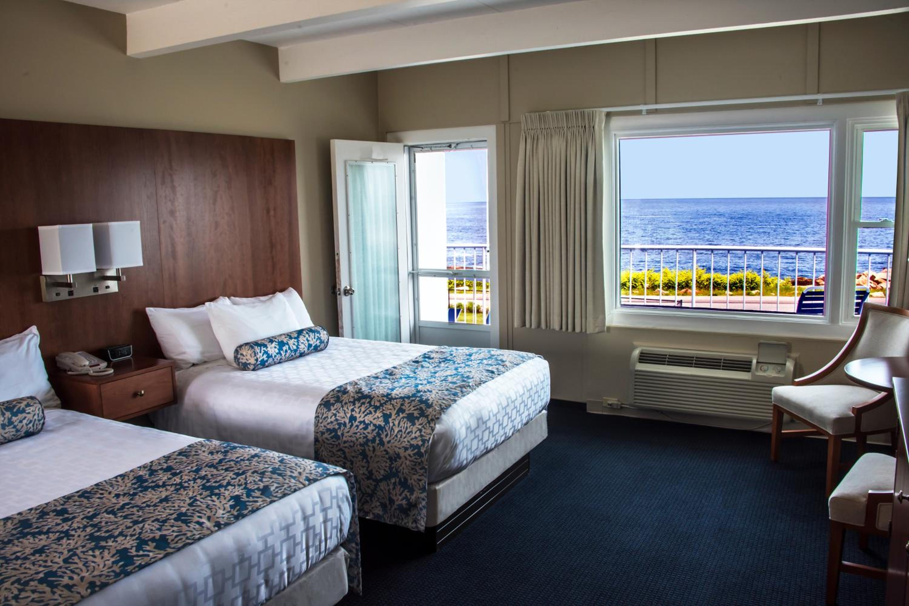 Deluxe Queen Room with Two Queen Beds with Balcony and Ocean View photo 1