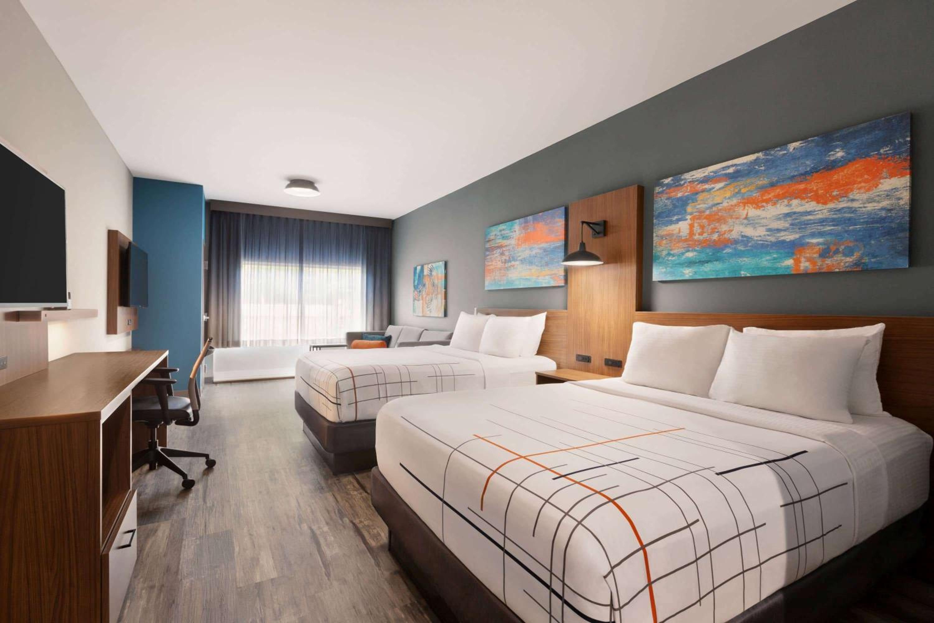 Deluxe Queen Room with Two Queen Beds - Non-Smoking - Photo 1