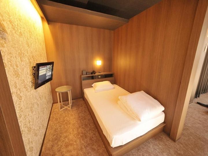 Bed in Male Dormitory Room photo 1