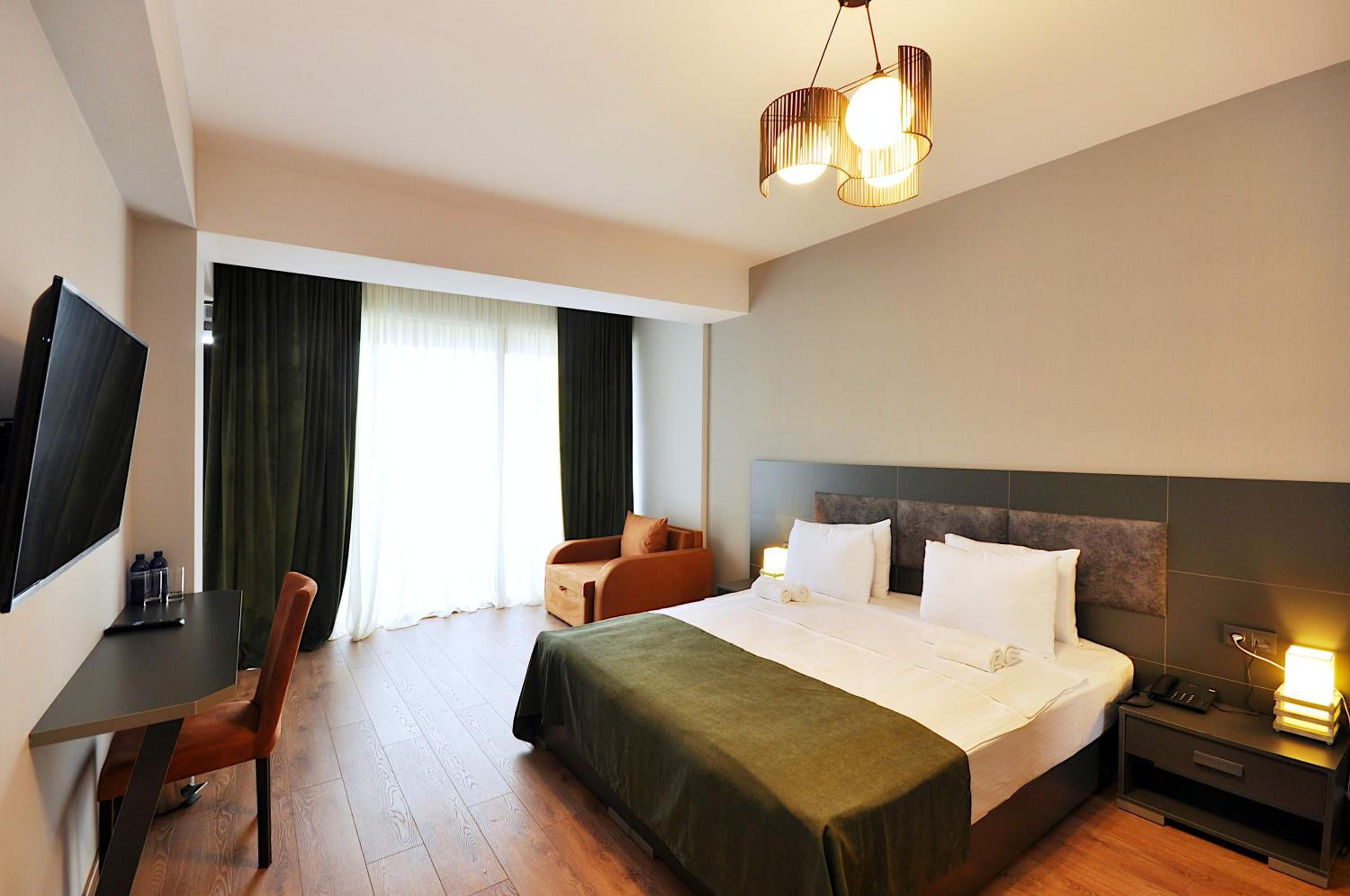 Deluxe Double Room with Balcony - Photo 2