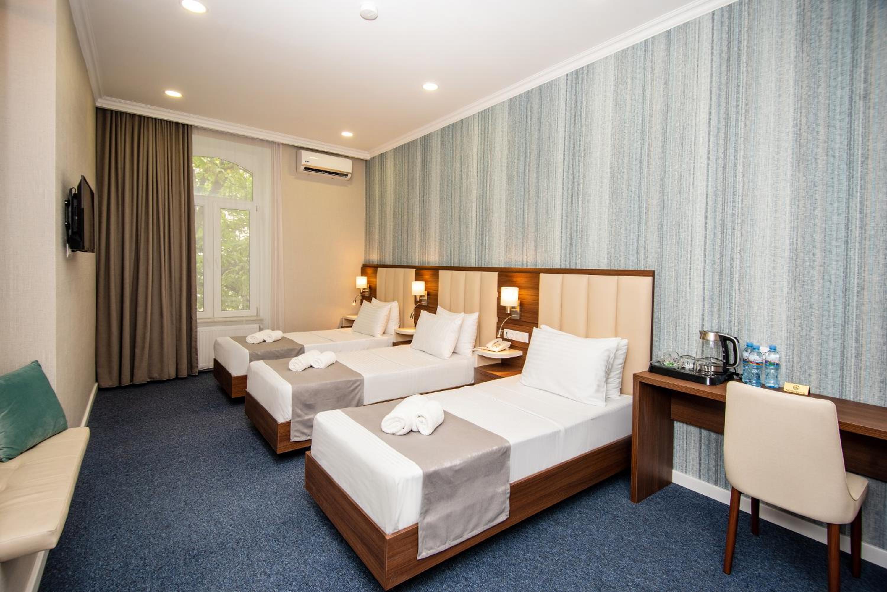 Triple Room - Photo 1