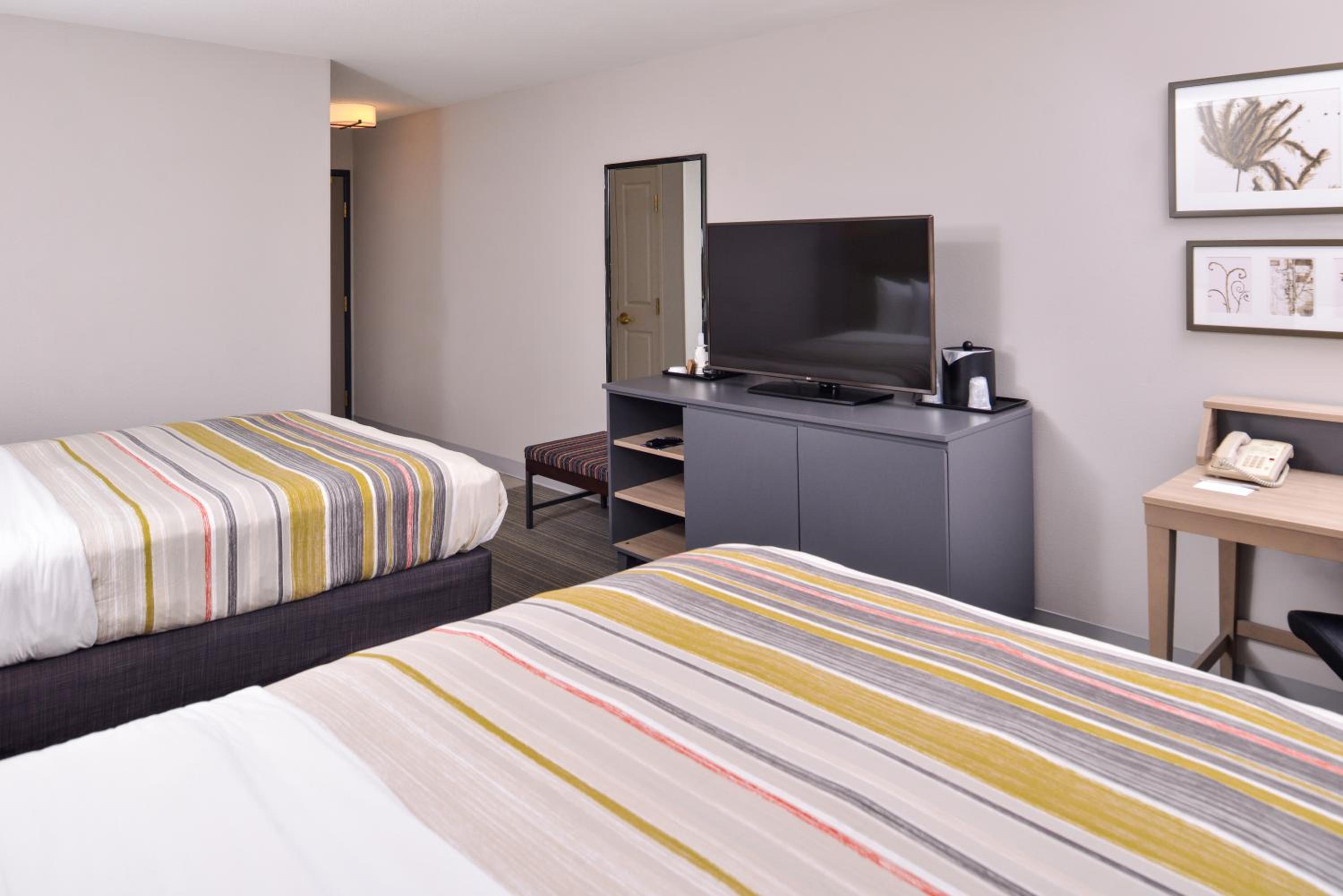 Queen Room with Two Queen Beds - Photo 1