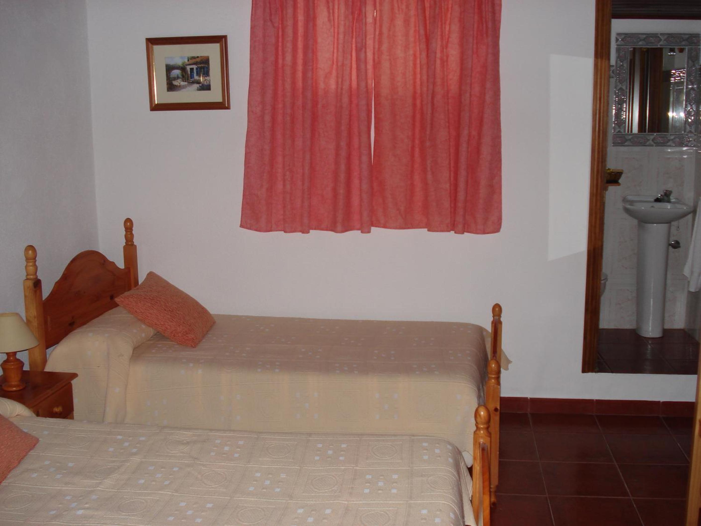 Casa de cuatro habitaciones