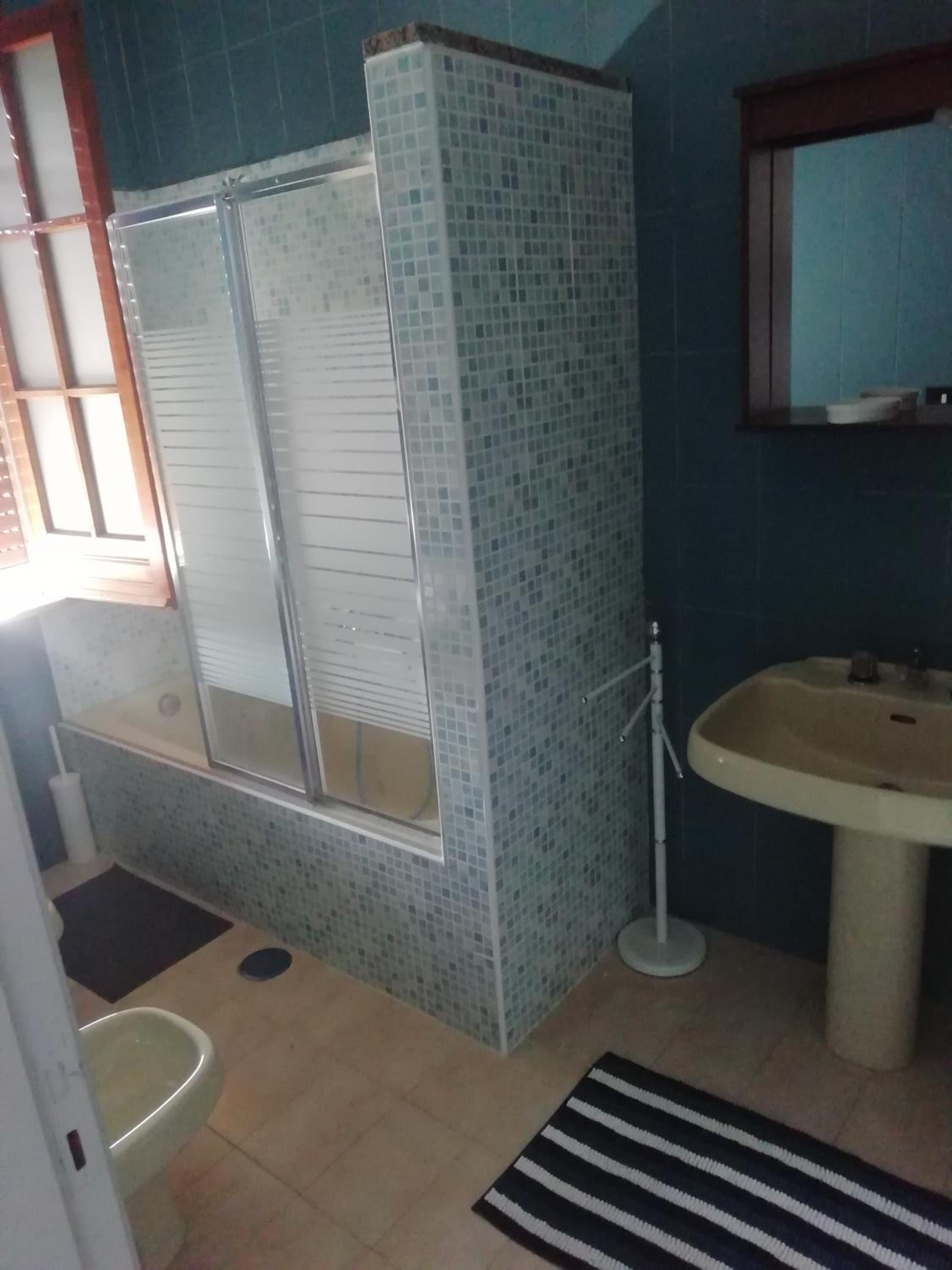 Three-Bedroom House - Photo 16