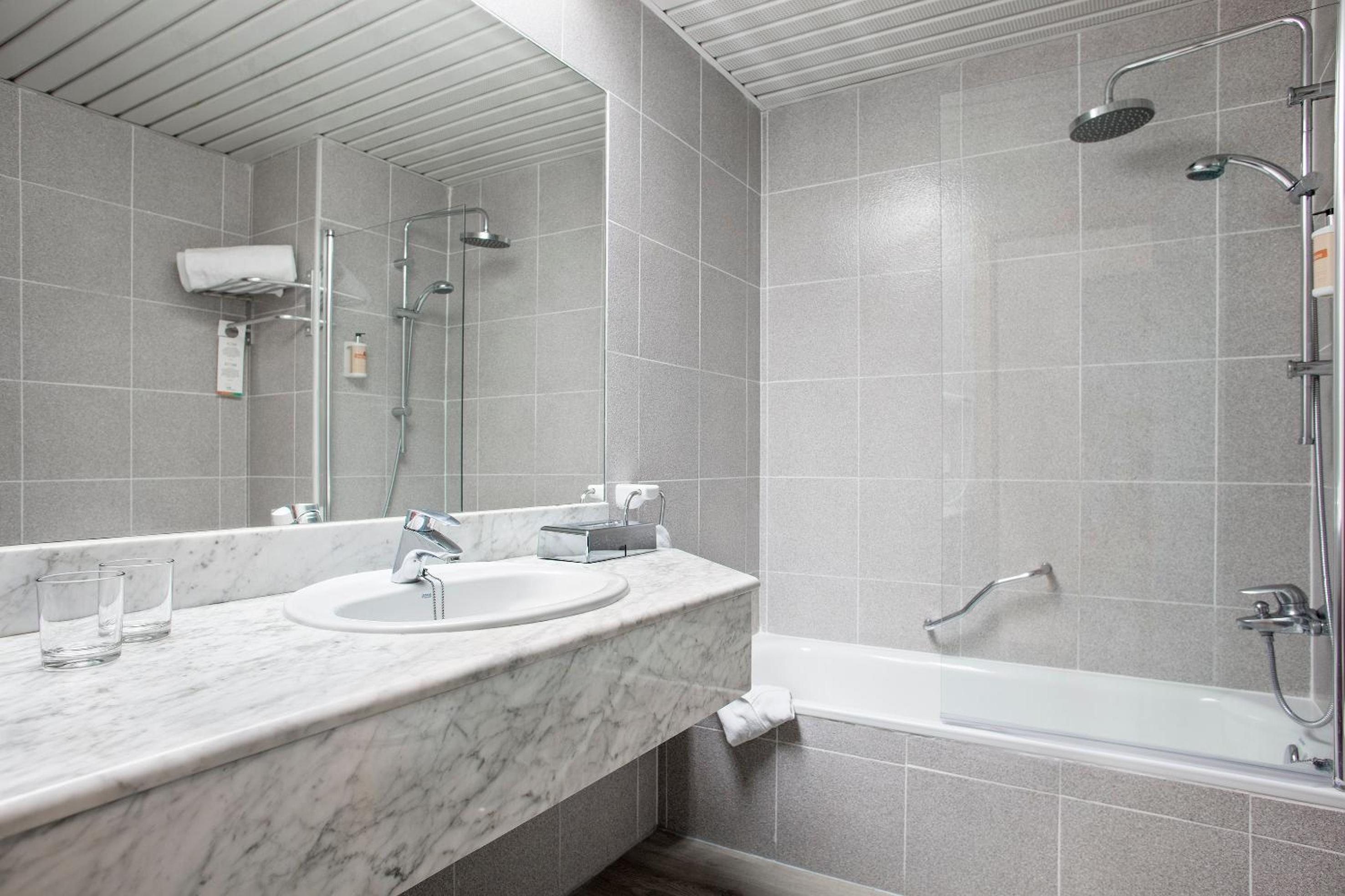 Relax in our stylish and modern bathroom oasis.
