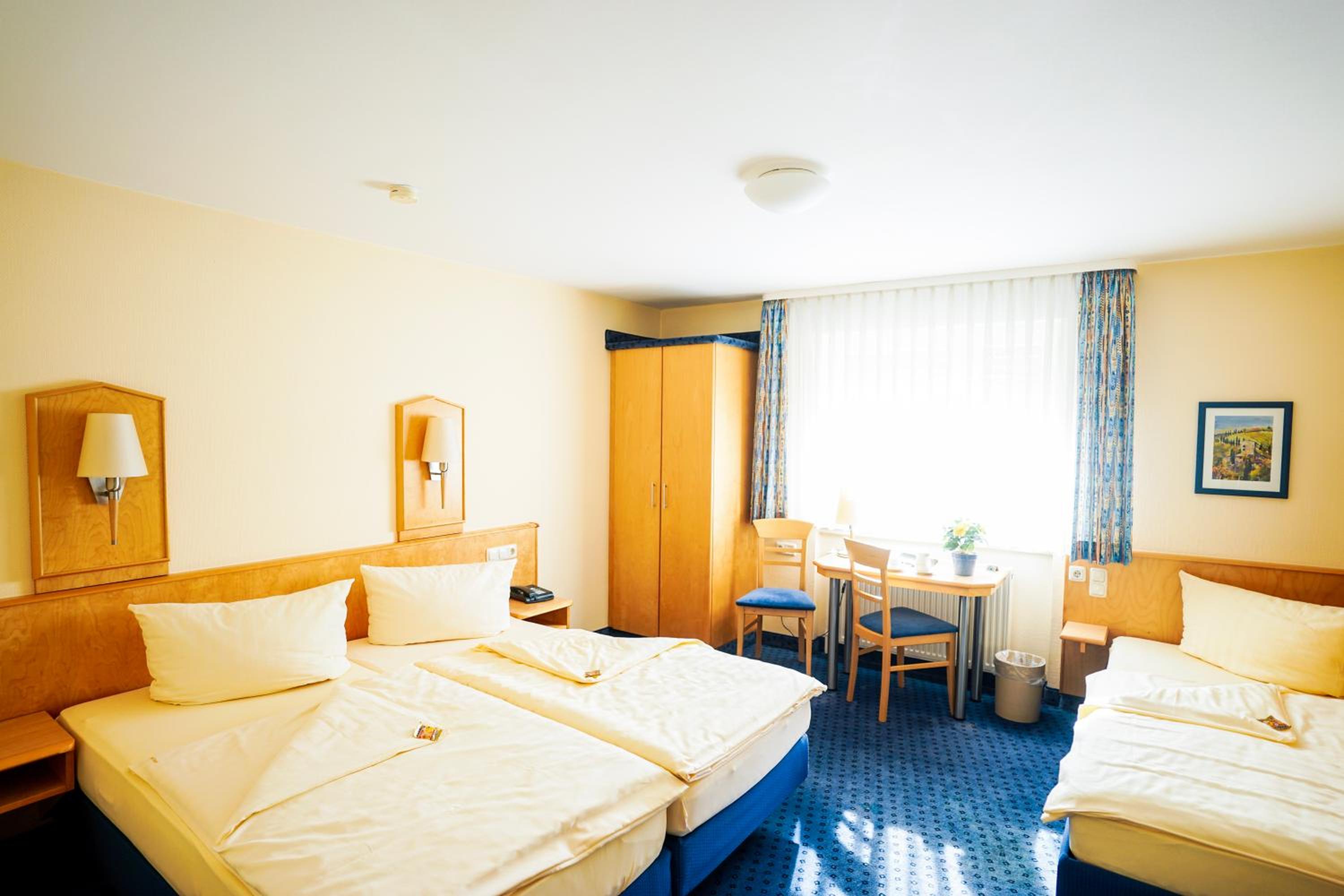 Standard Triple Room - Photo 13
