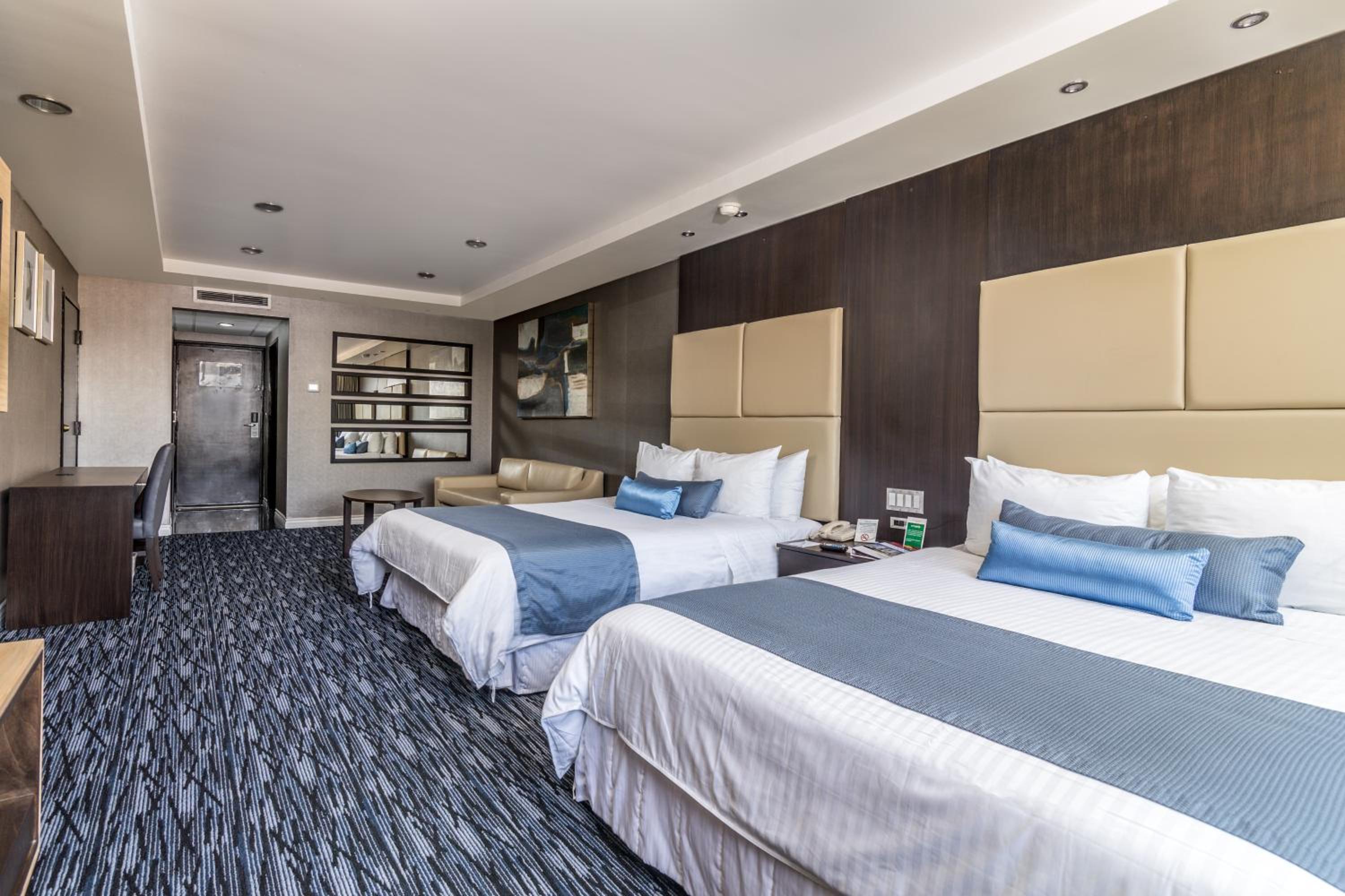 Queen Suite with Two Queen Beds - Photo 1