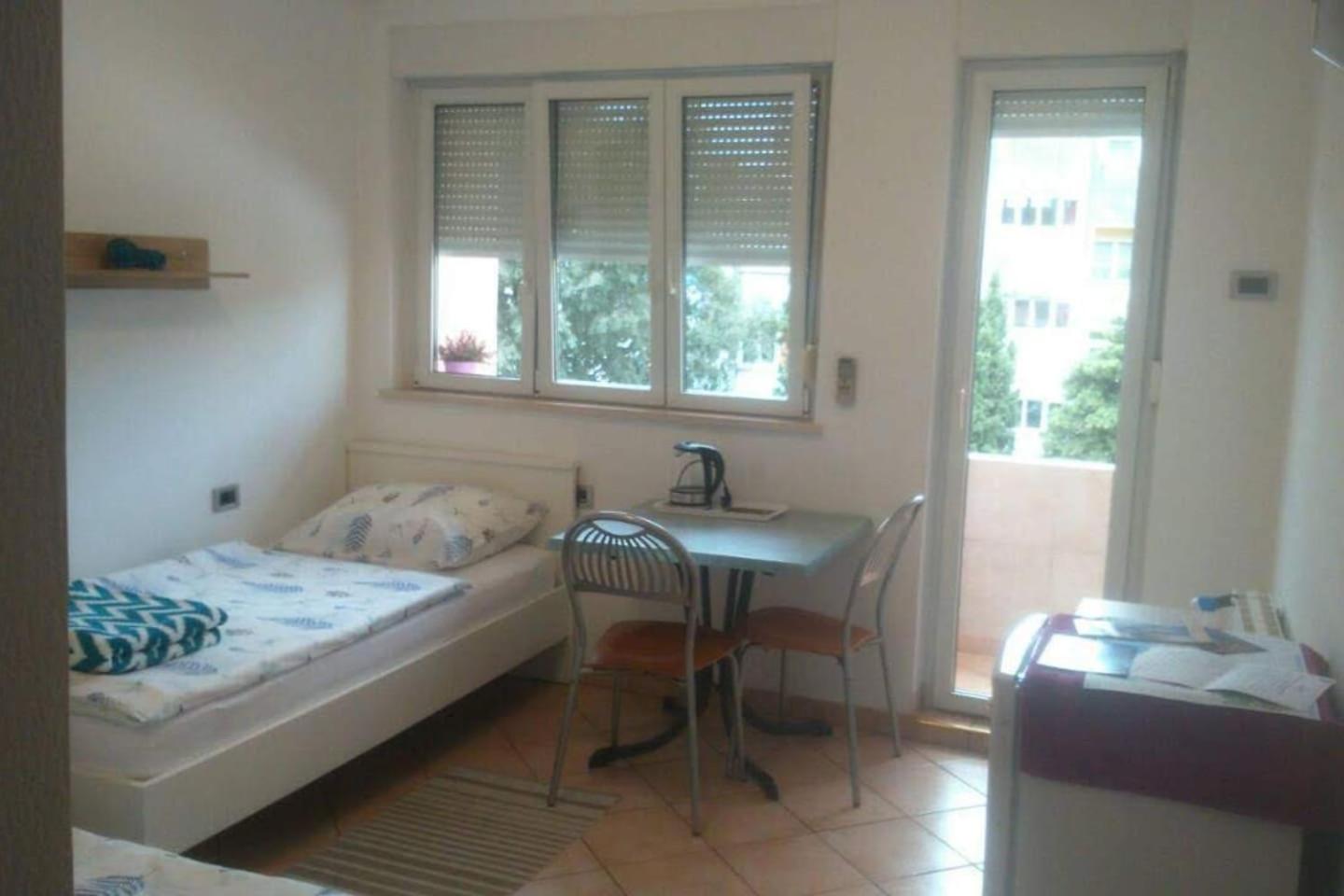 Apartment with Balcony - Photo 1