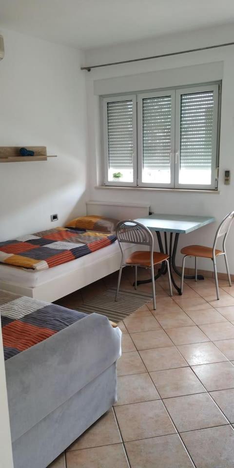 Apartment with Balcony - Photo 2