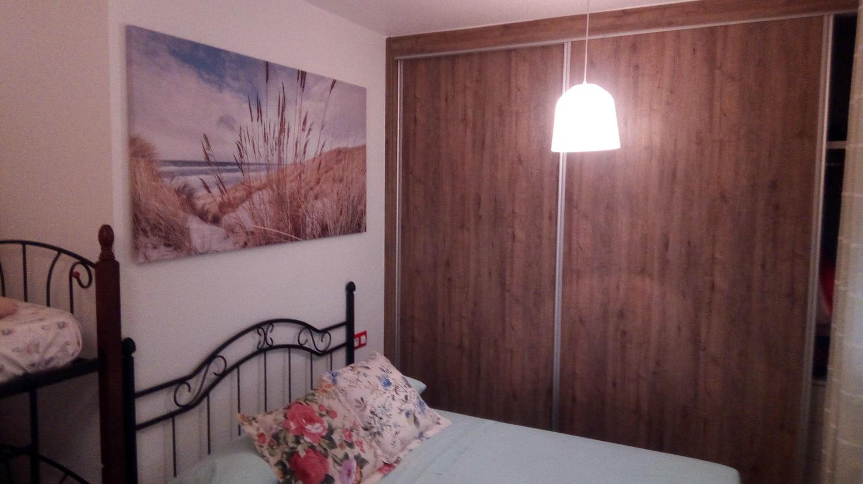 Three-Bedroom Apartment - Photo 59