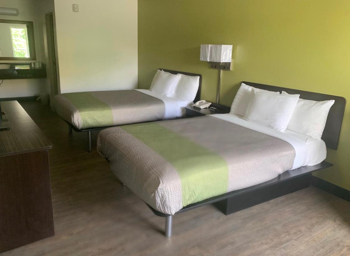Deluxe Queen Room with Two Queen Beds - Non-Smoking photo 1