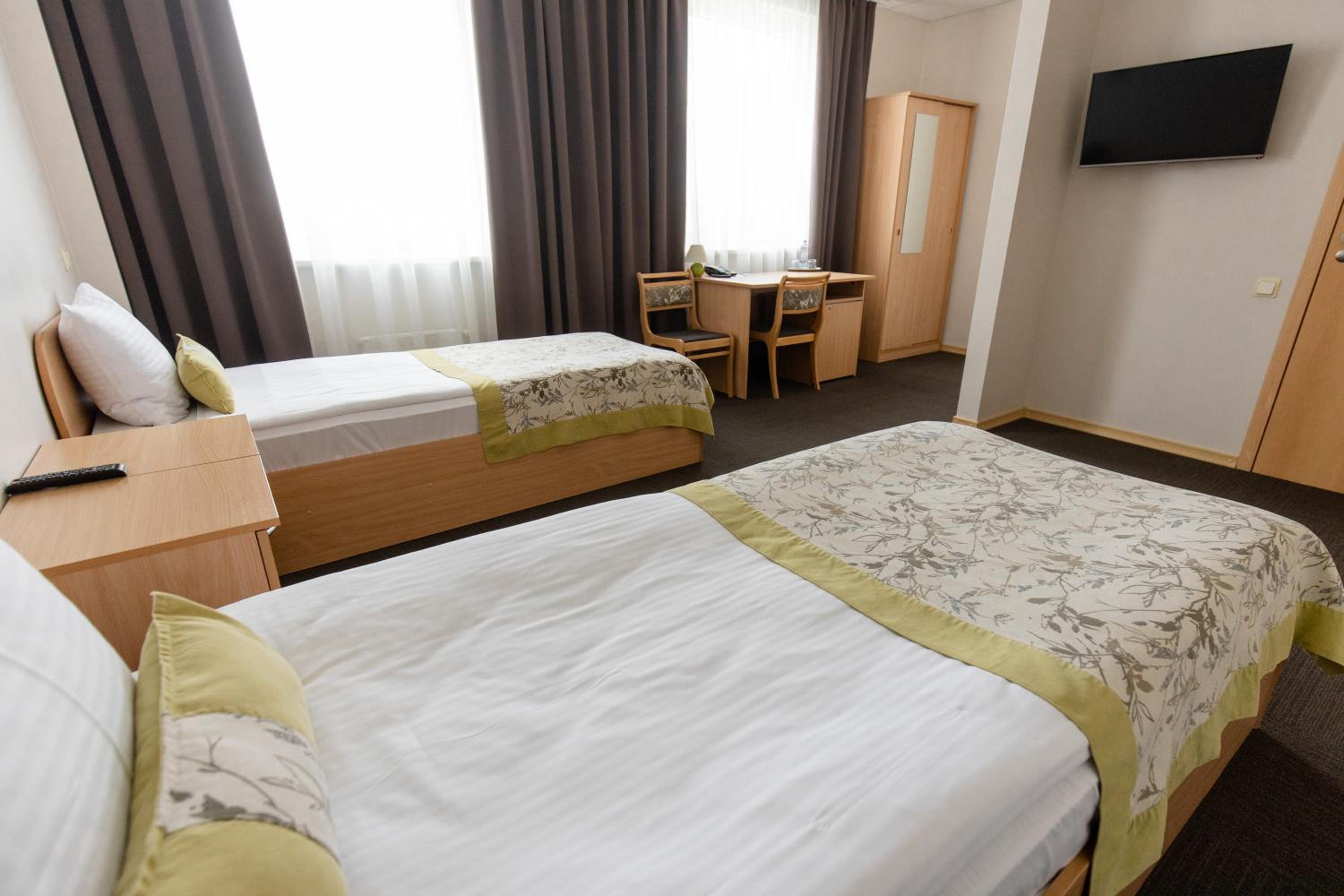 Twin Room - Photo 1