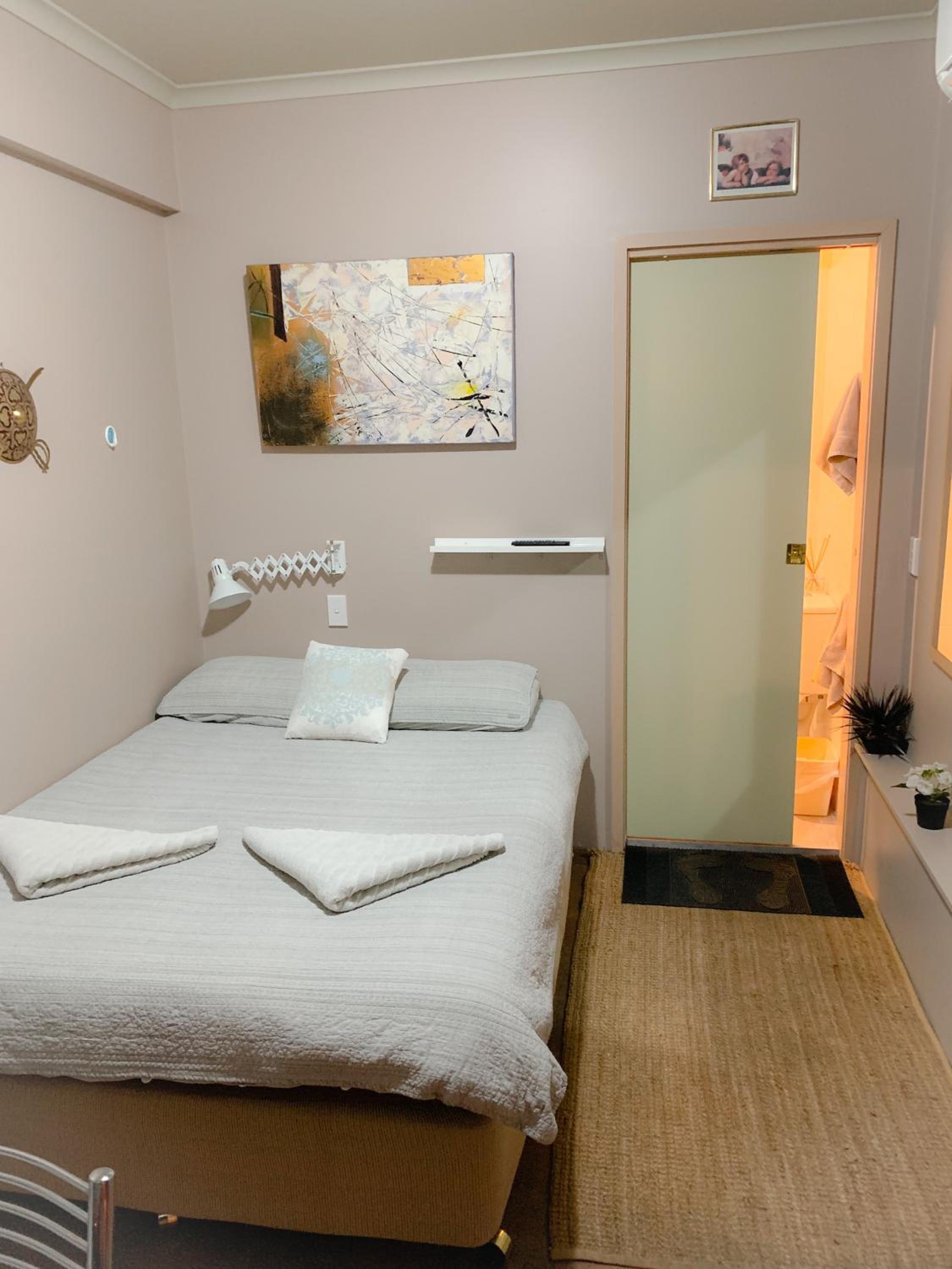 Small Compact Motel Style Room (internal window only)