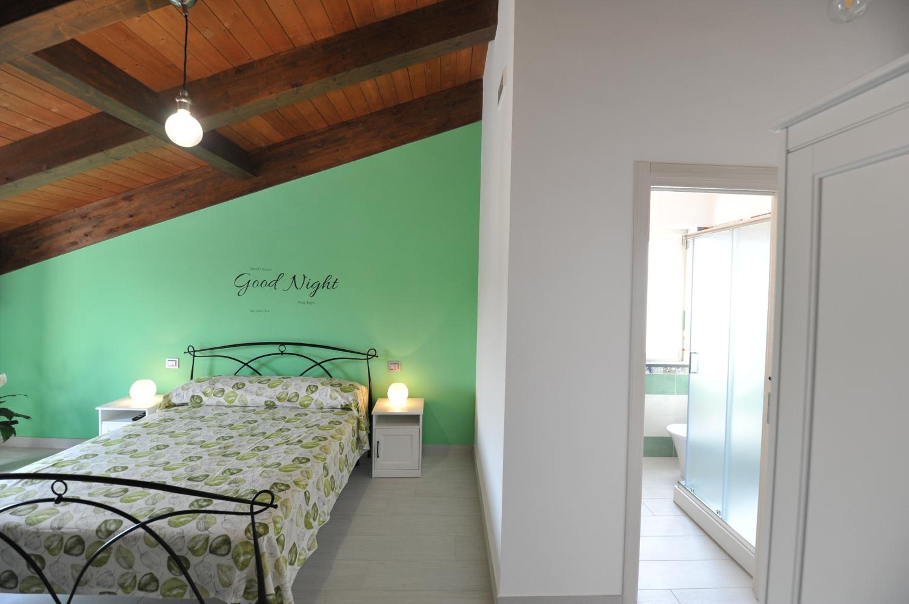 Quadruple Room with Private Bathroom