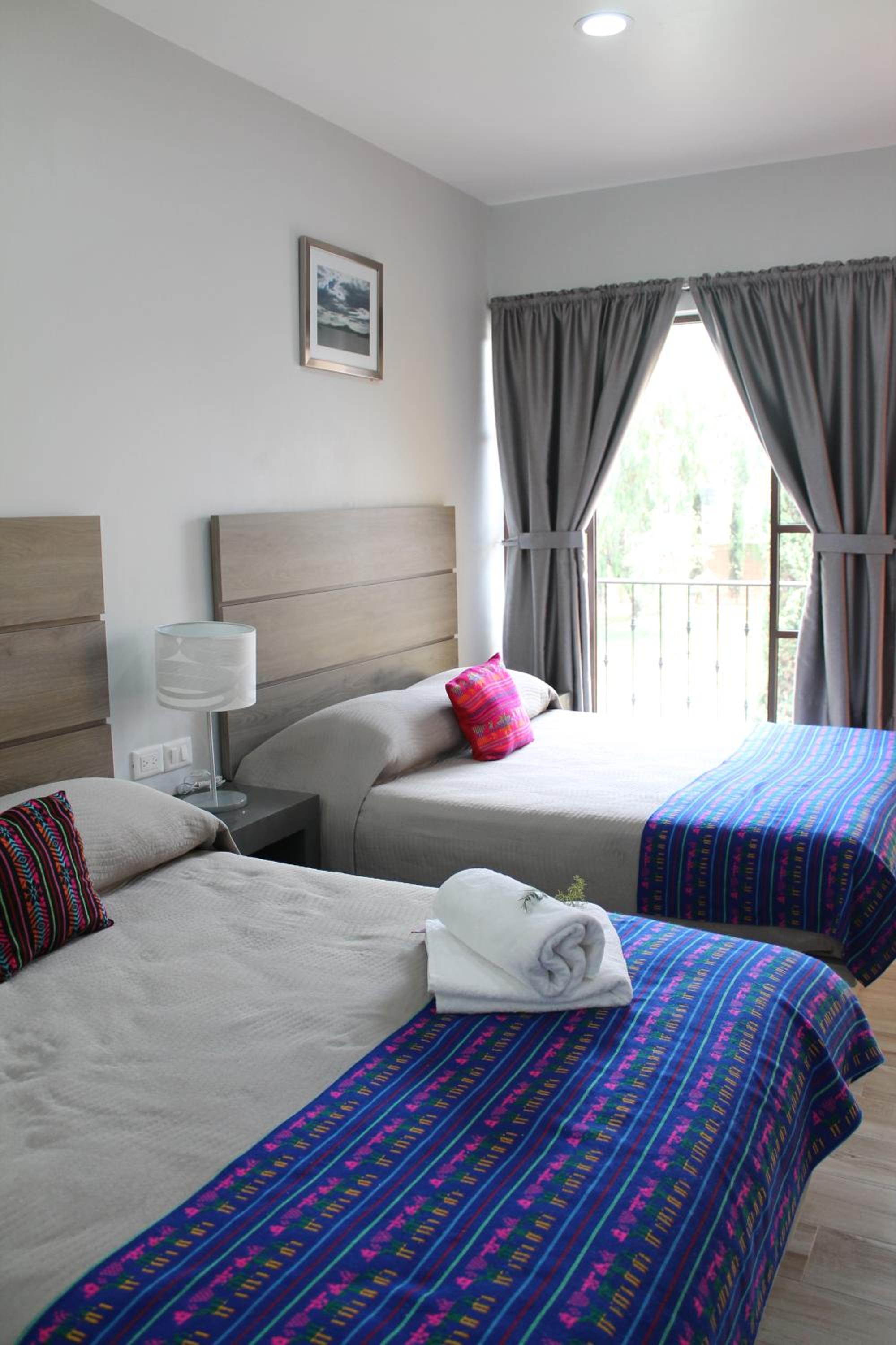 Deluxe Queen Room with Two Queen Beds photo 2