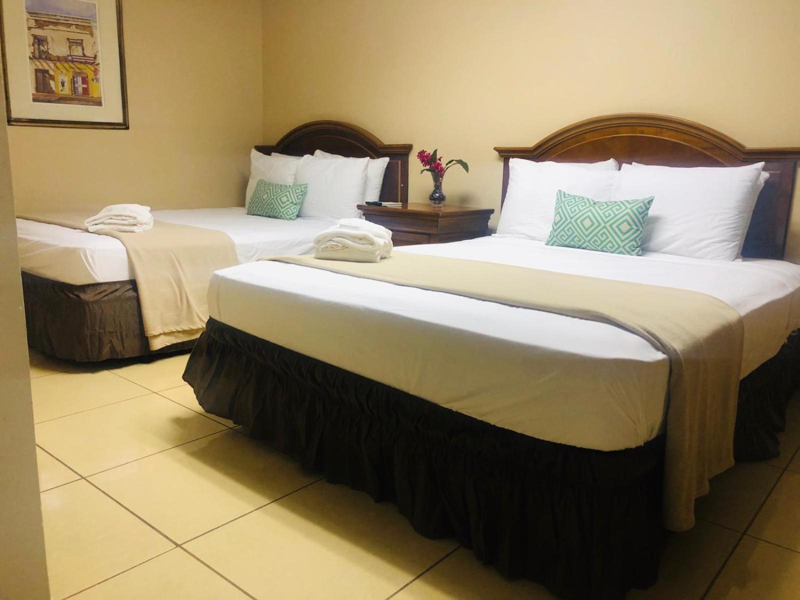 Deluxe Queen Room with Two Queen Beds photo 1