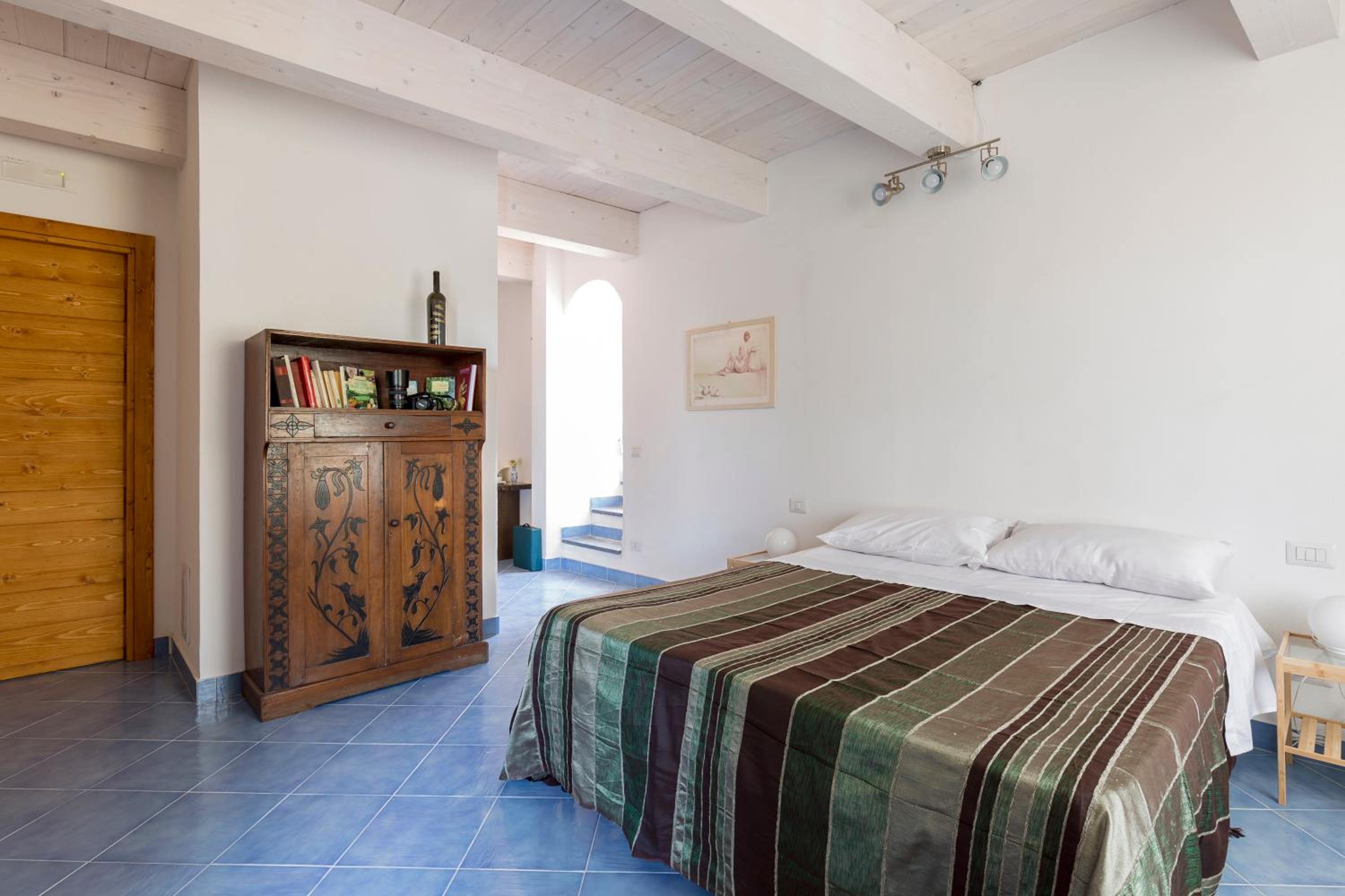 Quadruple Room with Private Bathroom