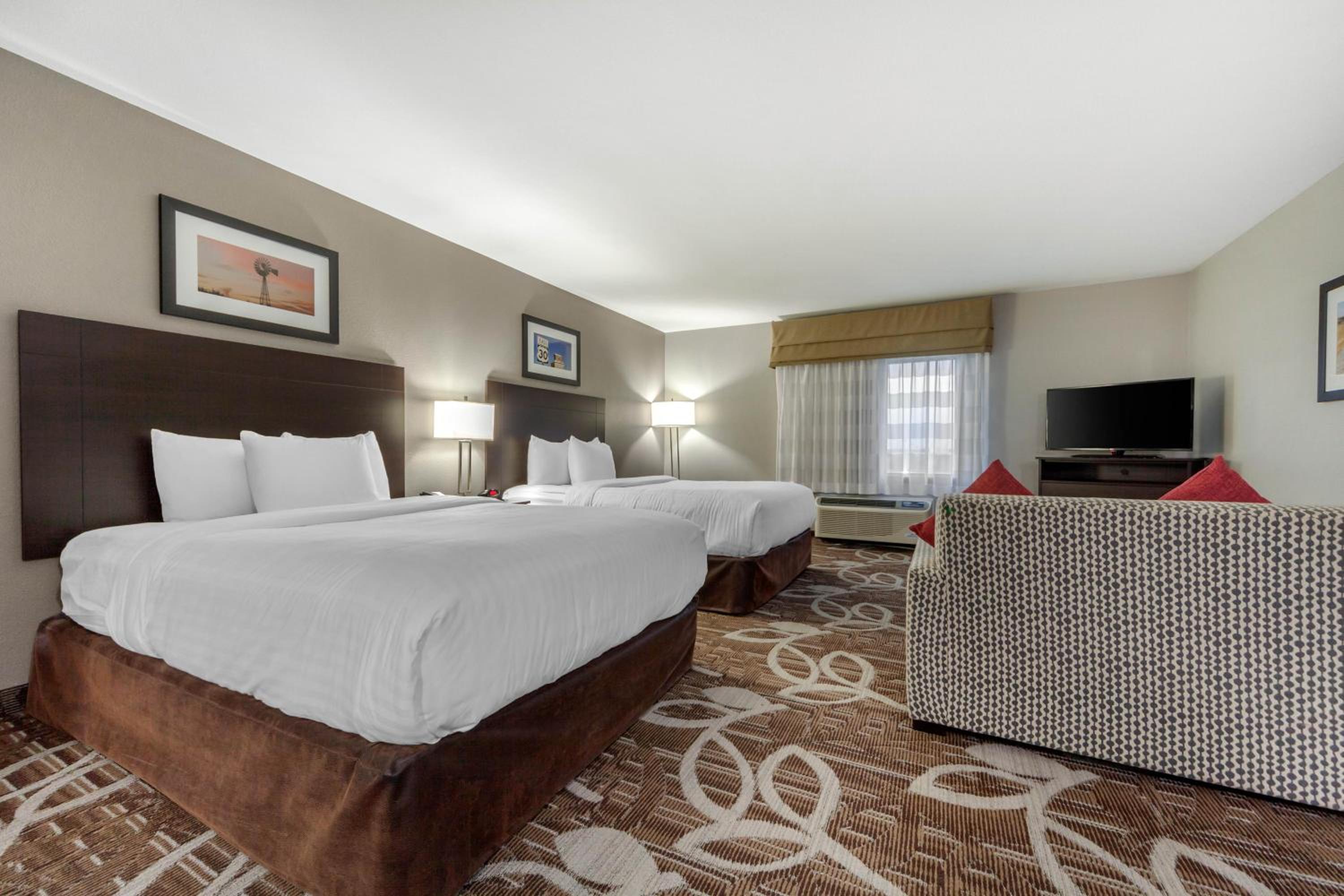 Queen Suite with Two Queen Beds and Sofa Bed