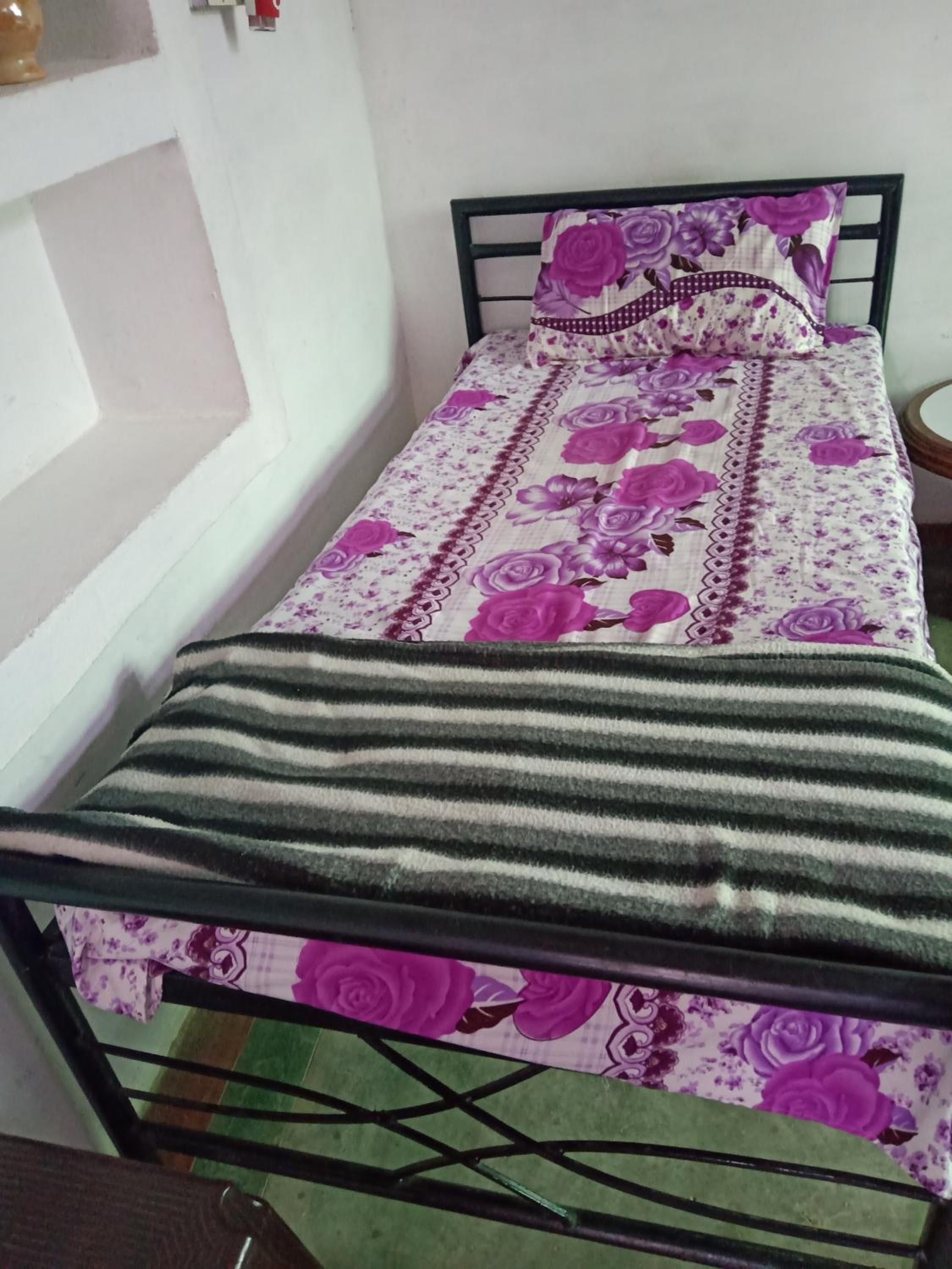 Single Bed in Female Dormitory Room